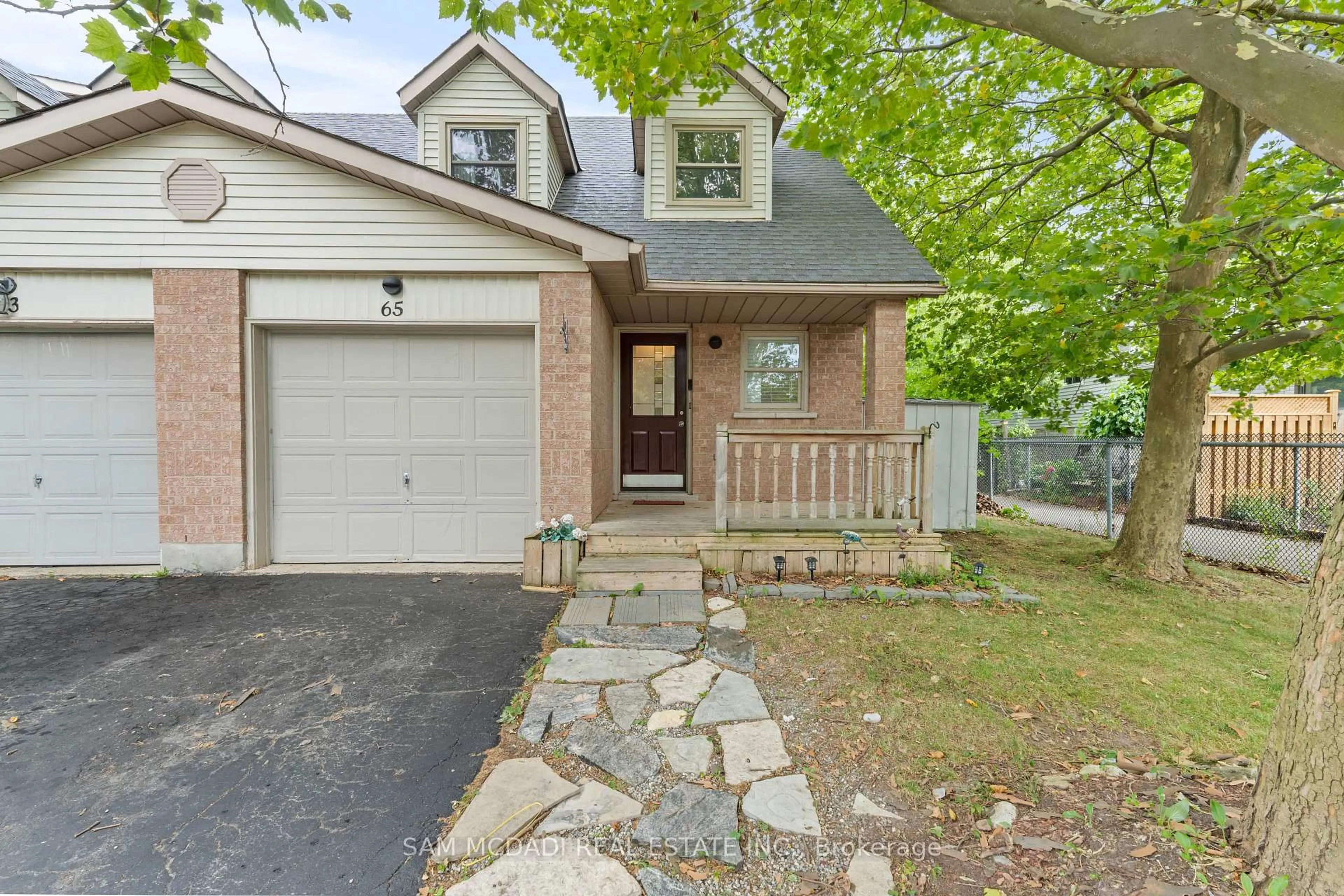 Home with brick exterior material, street for 65 Edgemere Dr, Cambridge Ontario N1P 1B3