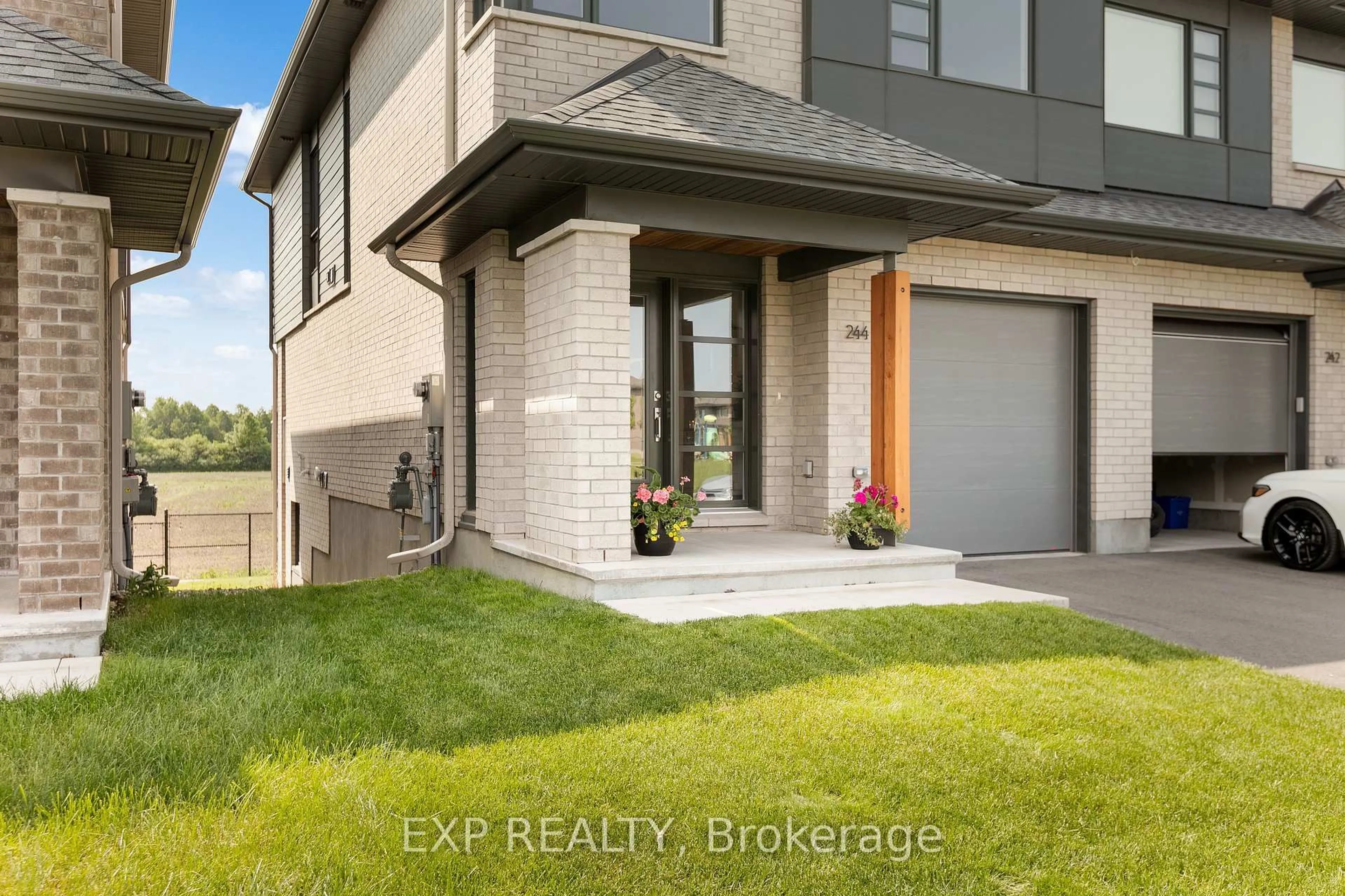 Home with brick exterior material, street for 244 Shuttleworth Dr, Ottawa Ontario K1T 0T4