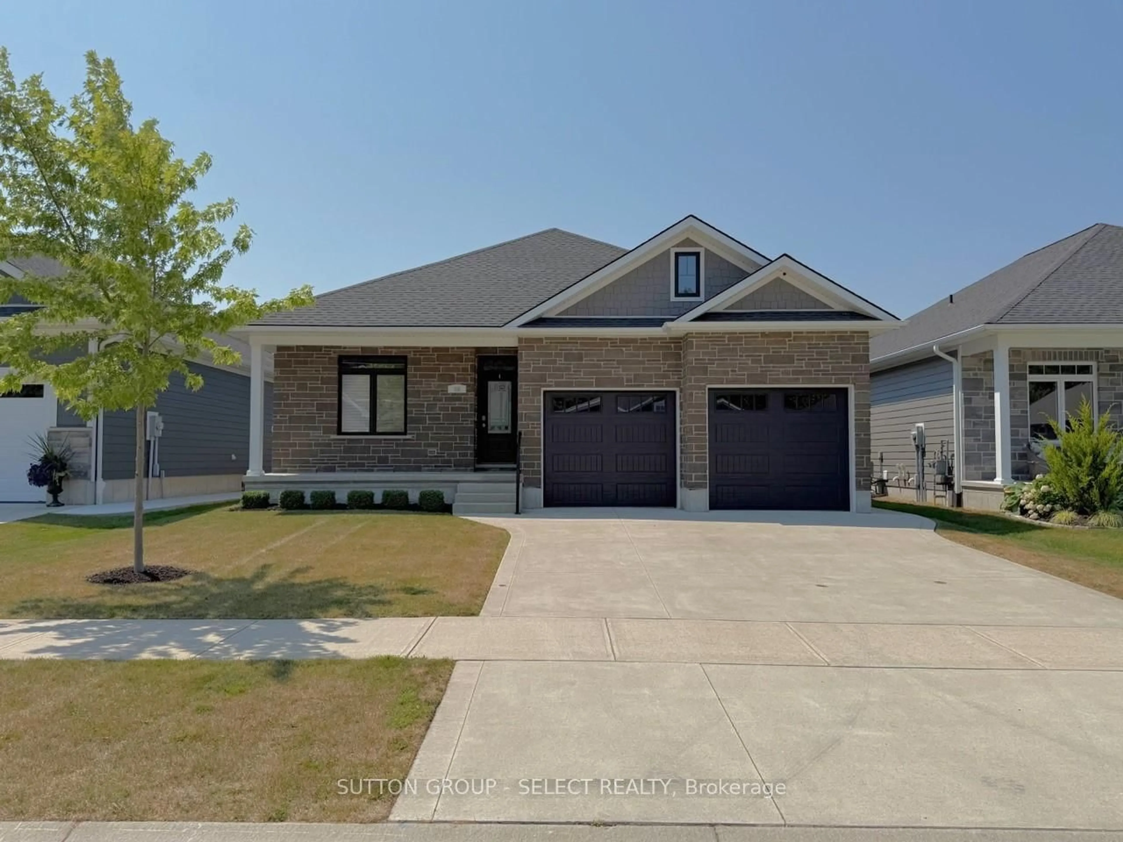 Home with brick exterior material, street for 58 DEERFIELD Rd, Lambton Shores Ontario N0M 1T0