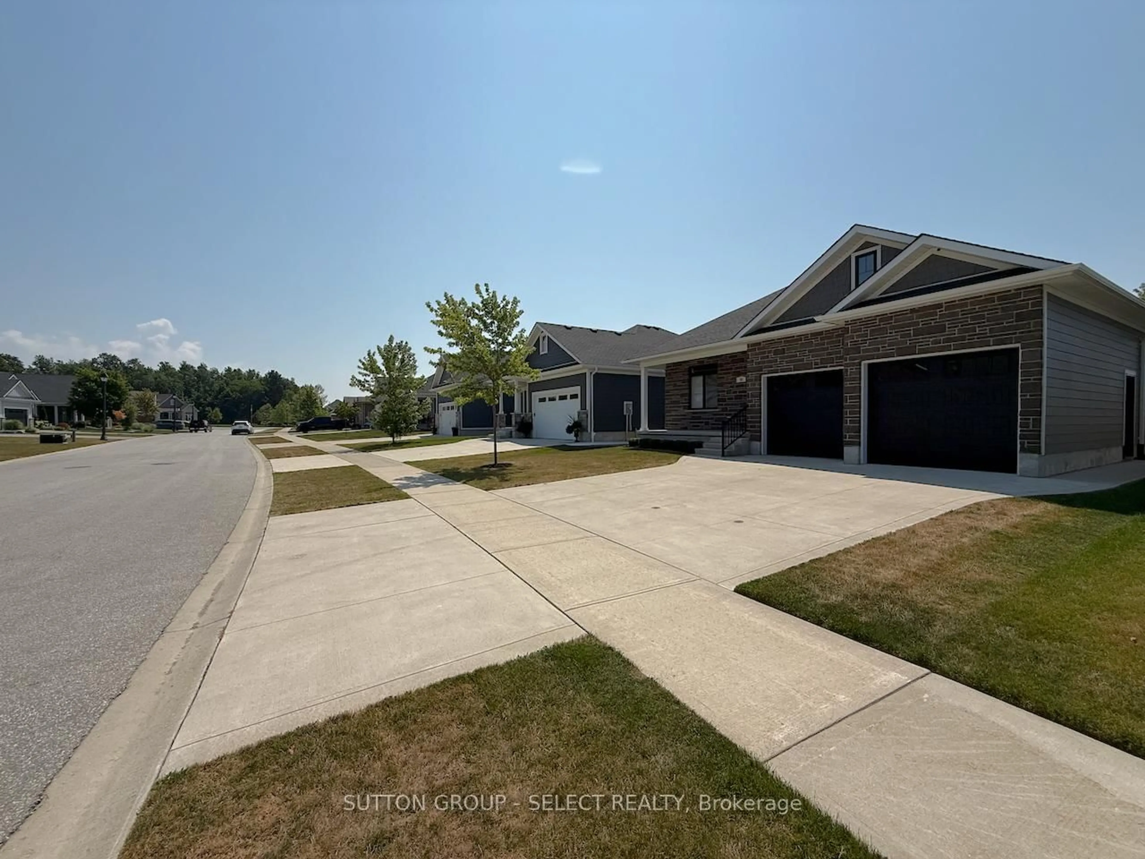 A pic from outside/outdoor area/front of a property/back of a property/a pic from drone, street for 58 DEERFIELD Rd, Lambton Shores Ontario N0M 1T0