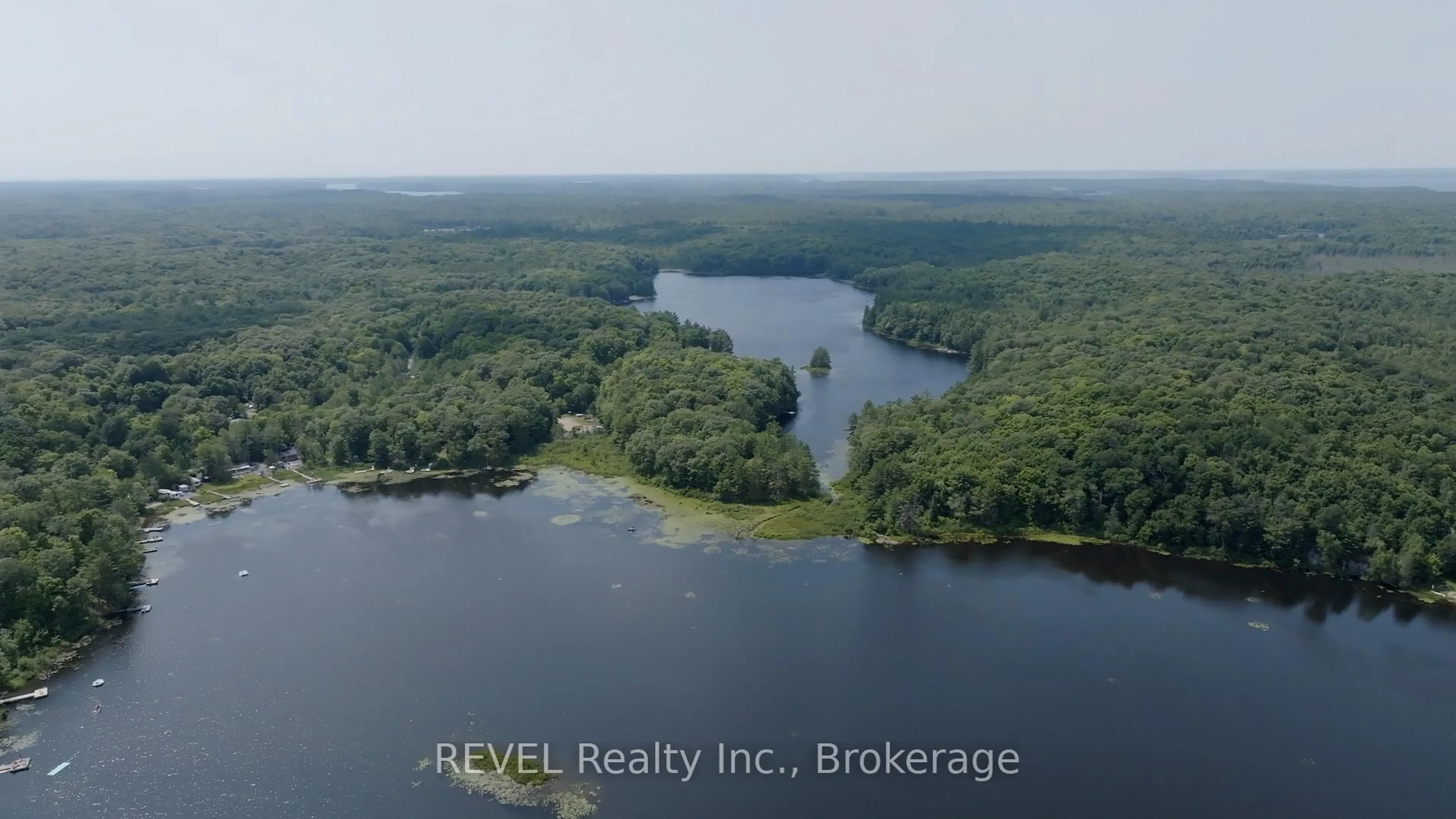 A pic from outside/outdoor area/front of a property/back of a property/a pic from drone, water/lake/river/ocean view for 105 BLUE LAKE ROAD #RL88, Seguin Ontario P2A 2W8