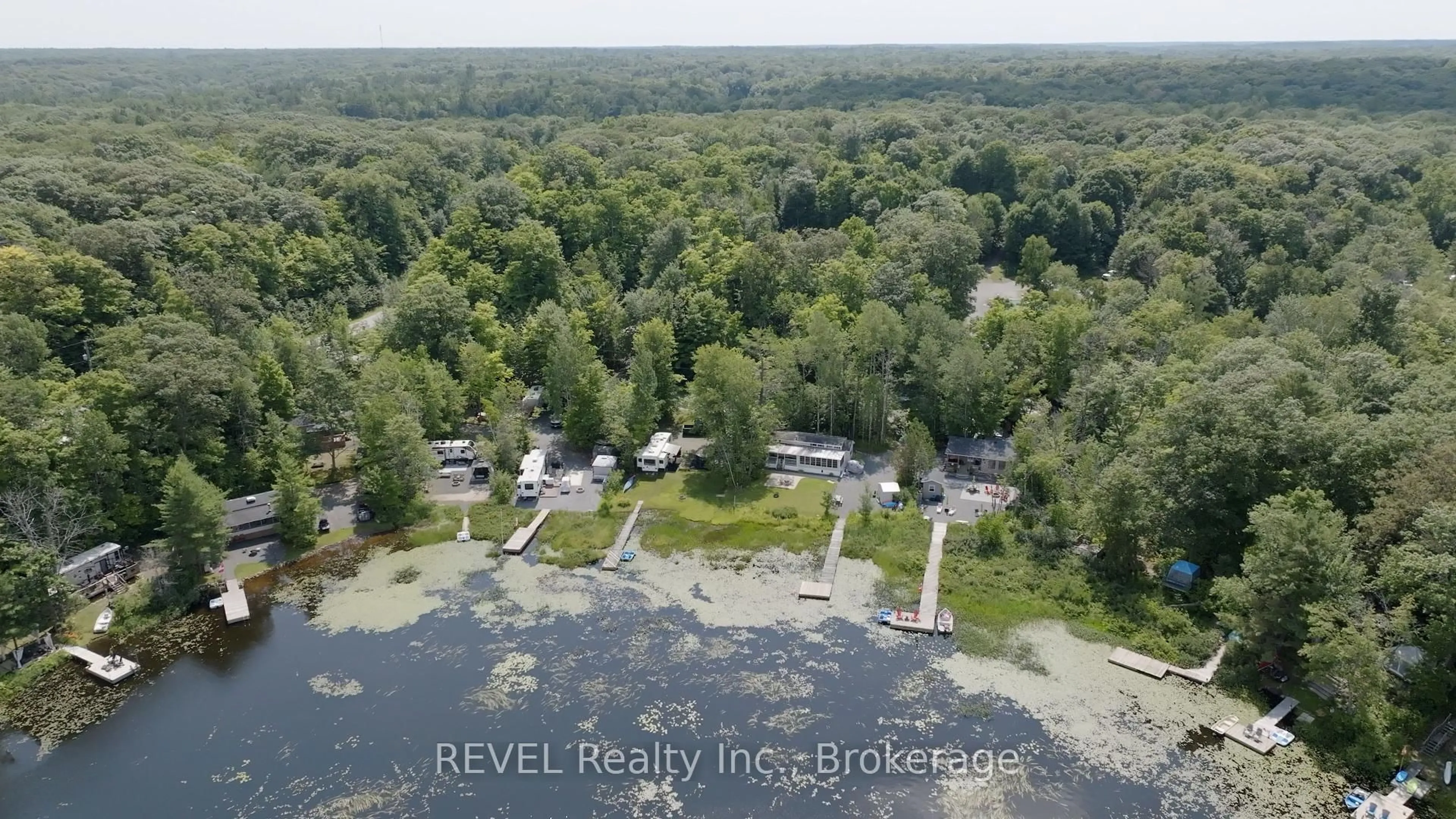 A pic from outside/outdoor area/front of a property/back of a property/a pic from drone, water/lake/river/ocean view for 105 BLUE LAKE ROAD #RL88, Seguin Ontario P2A 2W8