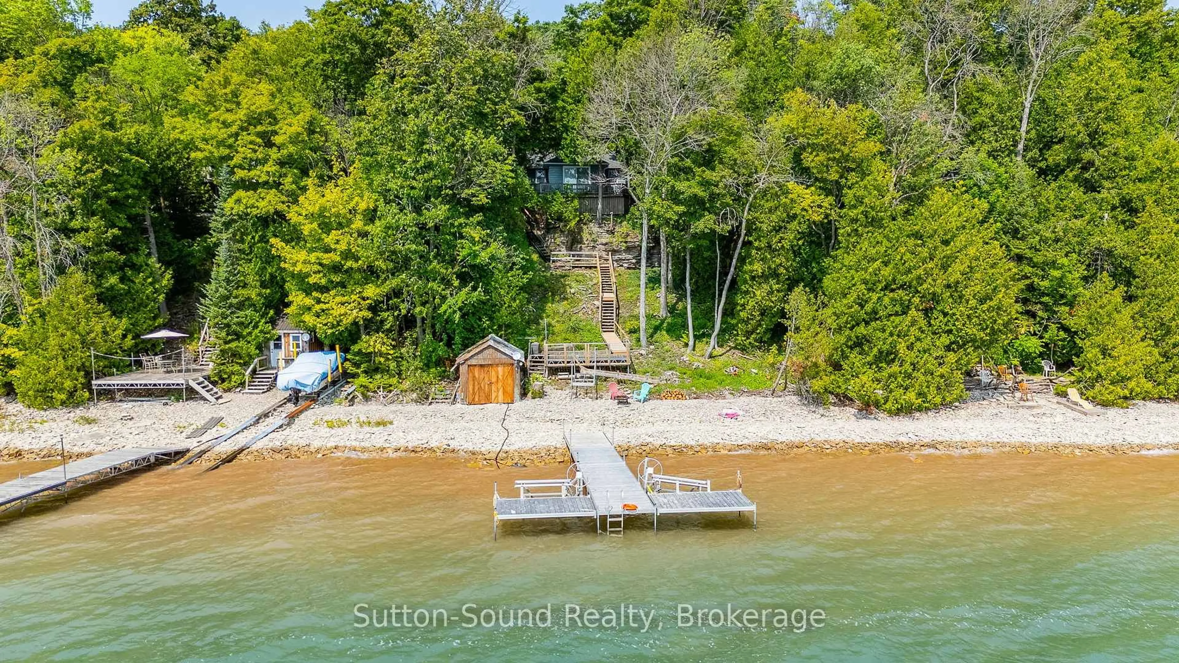 A pic from outside/outdoor area/front of a property/back of a property/a pic from drone, water/lake/river/ocean view for 606 Mallory Beach Rd, South Bruce Peninsula Ontario N0H 2T0