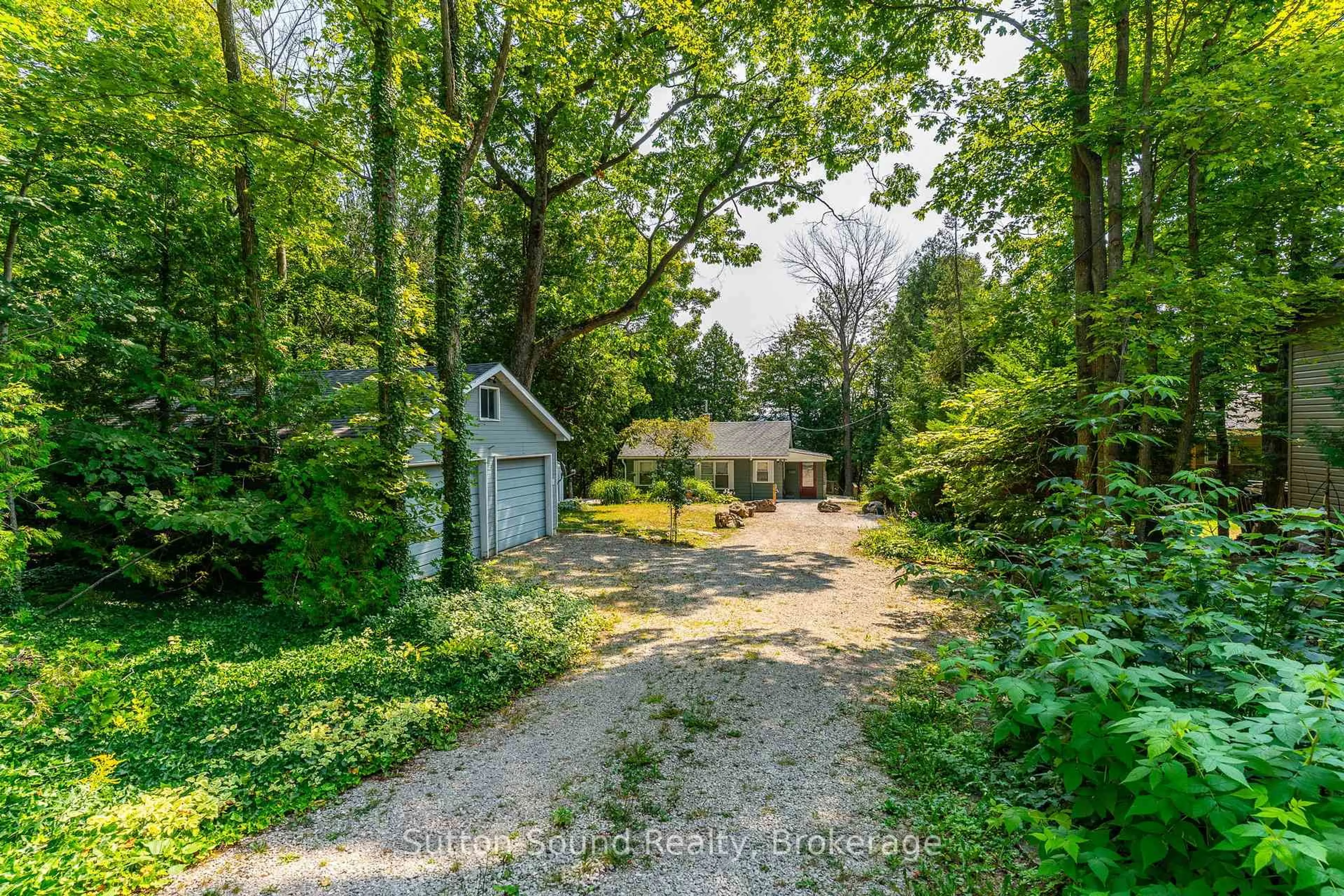 A pic from outside/outdoor area/front of a property/back of a property/a pic from drone, forest/trees view for 606 Mallory Beach Rd, South Bruce Peninsula Ontario N0H 2T0