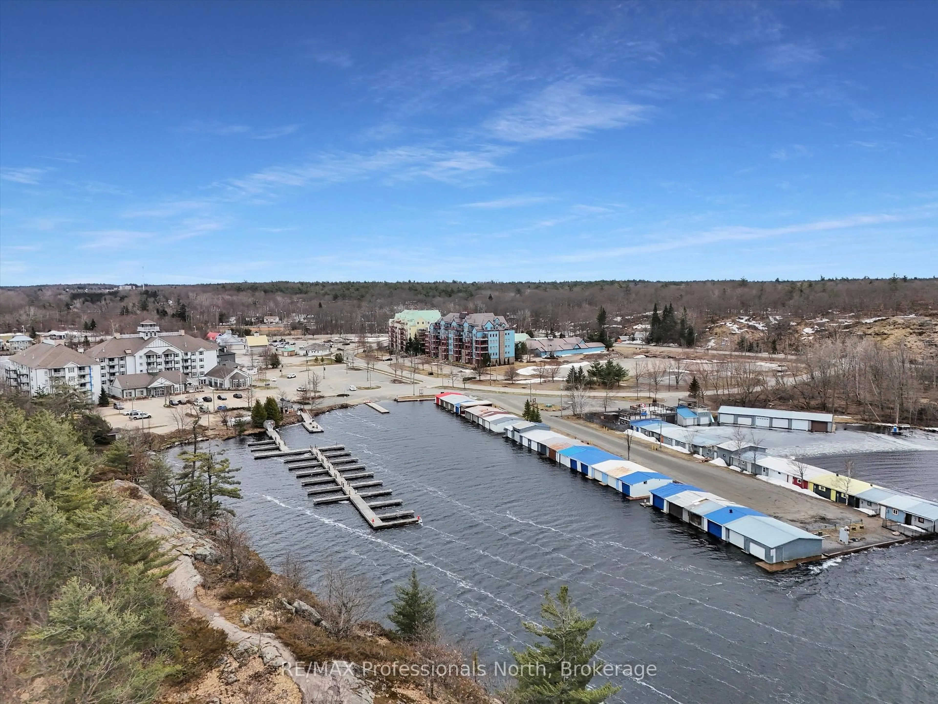 A pic from outside/outdoor area/front of a property/back of a property/a pic from drone, water/lake/river/ocean view for 130 STEAMSHIP BAY Rd #305, Gravenhurst Ontario P1P 1Z9