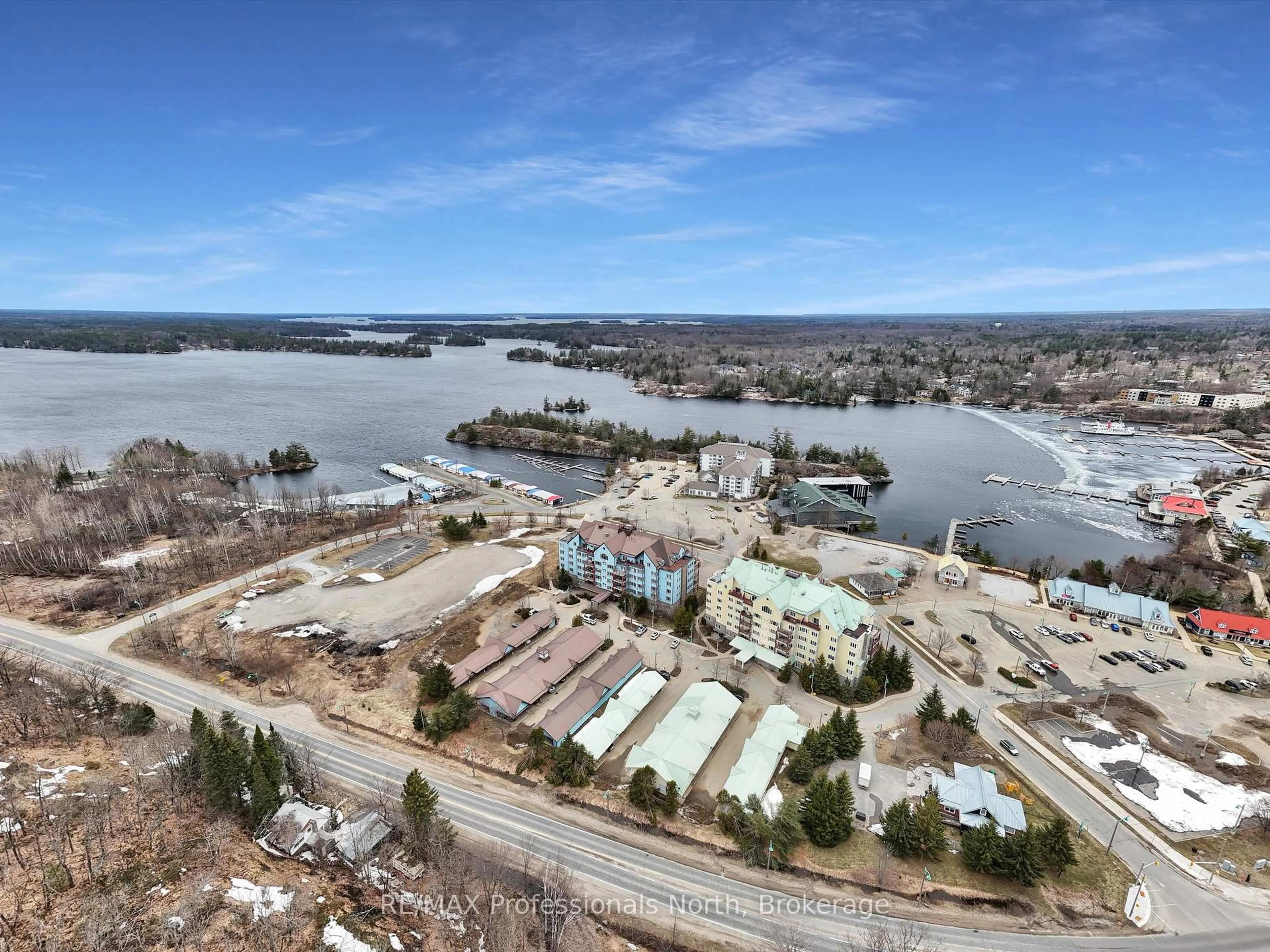 A pic from outside/outdoor area/front of a property/back of a property/a pic from drone, water/lake/river/ocean view for 130 STEAMSHIP BAY Rd #305, Gravenhurst Ontario P1P 1Z9