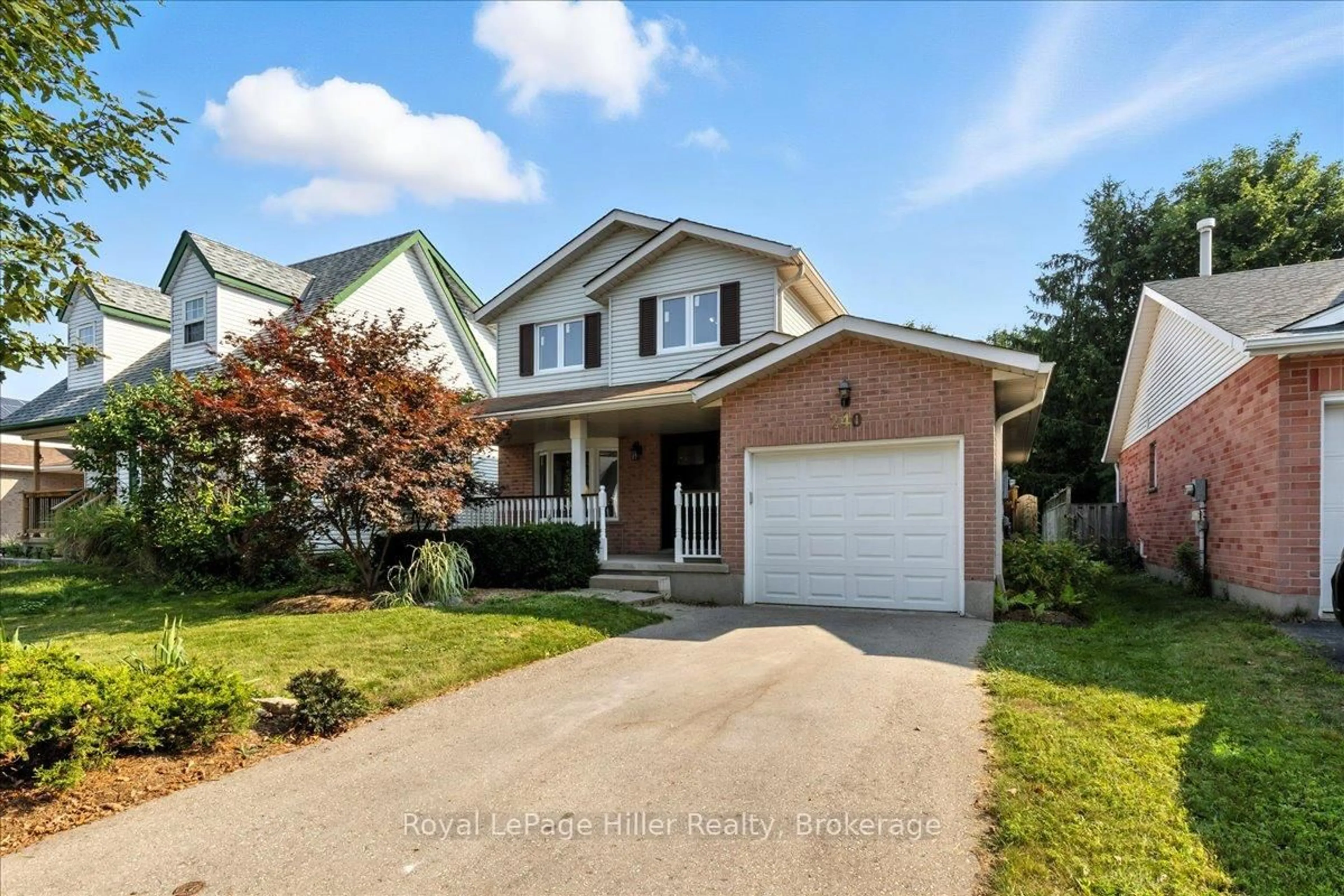 Home with brick exterior material, street for 240 Dartmoor Cres, Waterloo Ontario N2K 3S9
