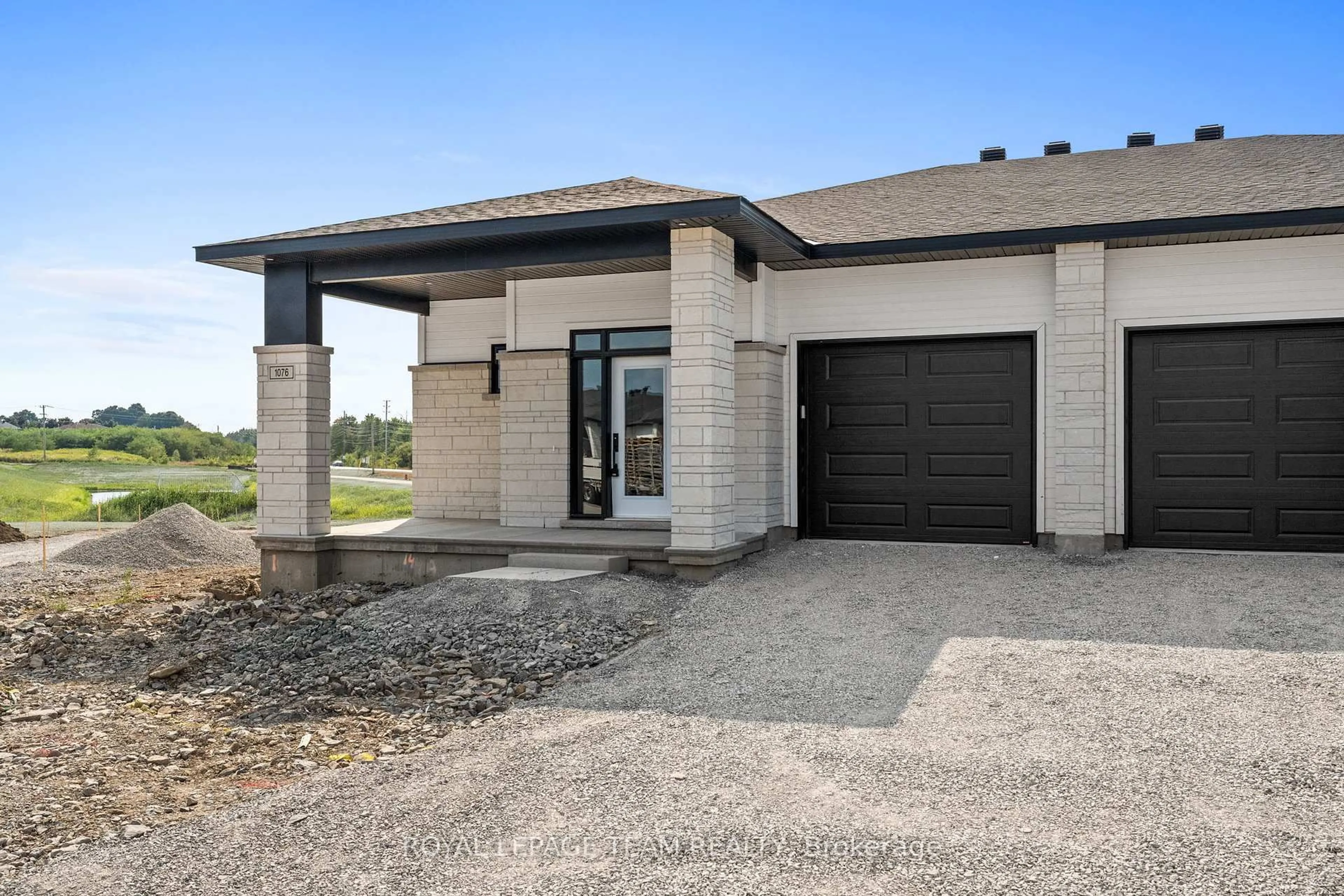 Home with brick exterior material, street for 1076 Moore St, Brockville Ontario K6V 7N1