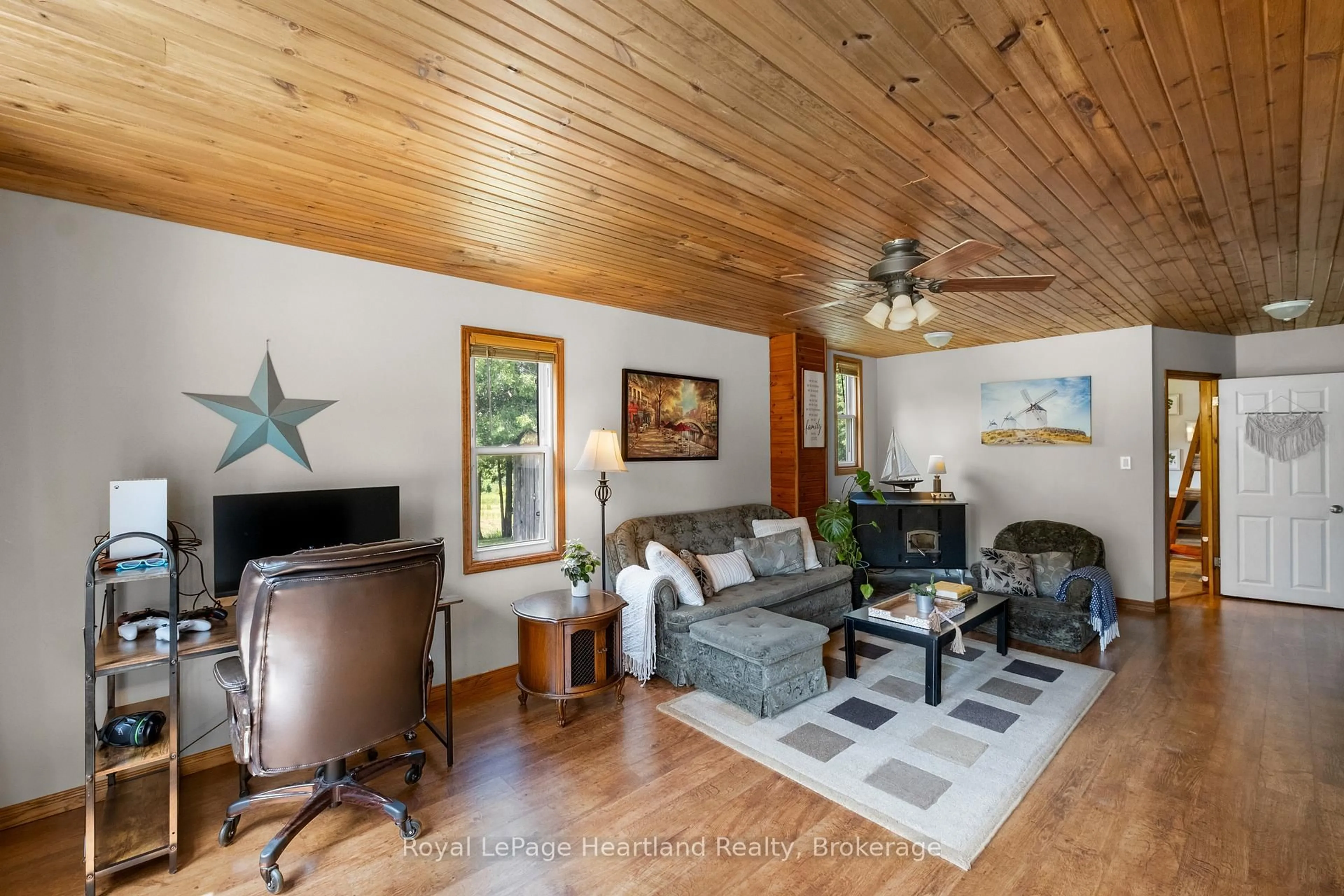 Living room with furniture, wood/laminate floor for 38480 Blyth Rd, Ashfield-Colborne-Wawanosh Ontario N0M 1E0