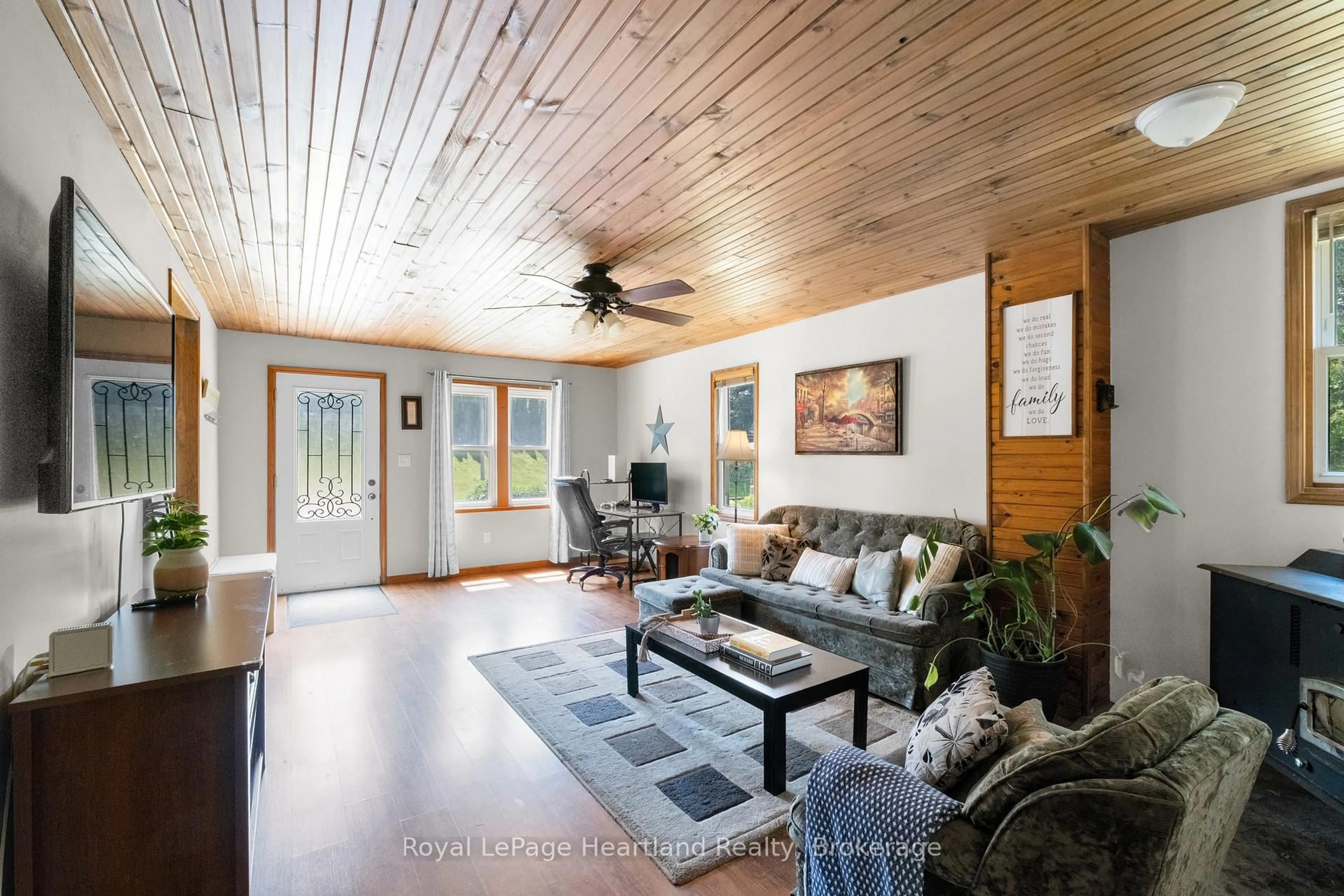 Living room with furniture, wood/laminate floor for 38480 Blyth Rd, Ashfield-Colborne-Wawanosh Ontario N0M 1E0
