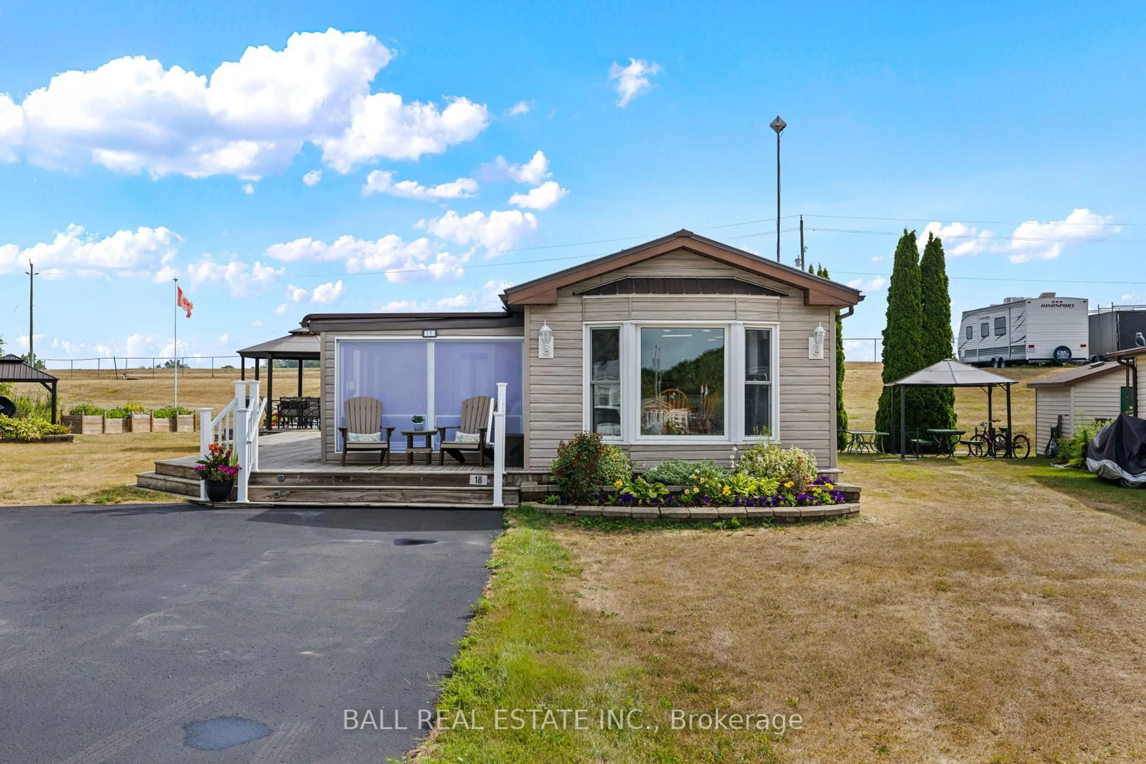 A pic from outside/outdoor area/front of a property/back of a property/a pic from drone, water/lake/river/ocean view for 18 Edwin Crt, Otonabee-South Monaghan Ontario K0L 2G0