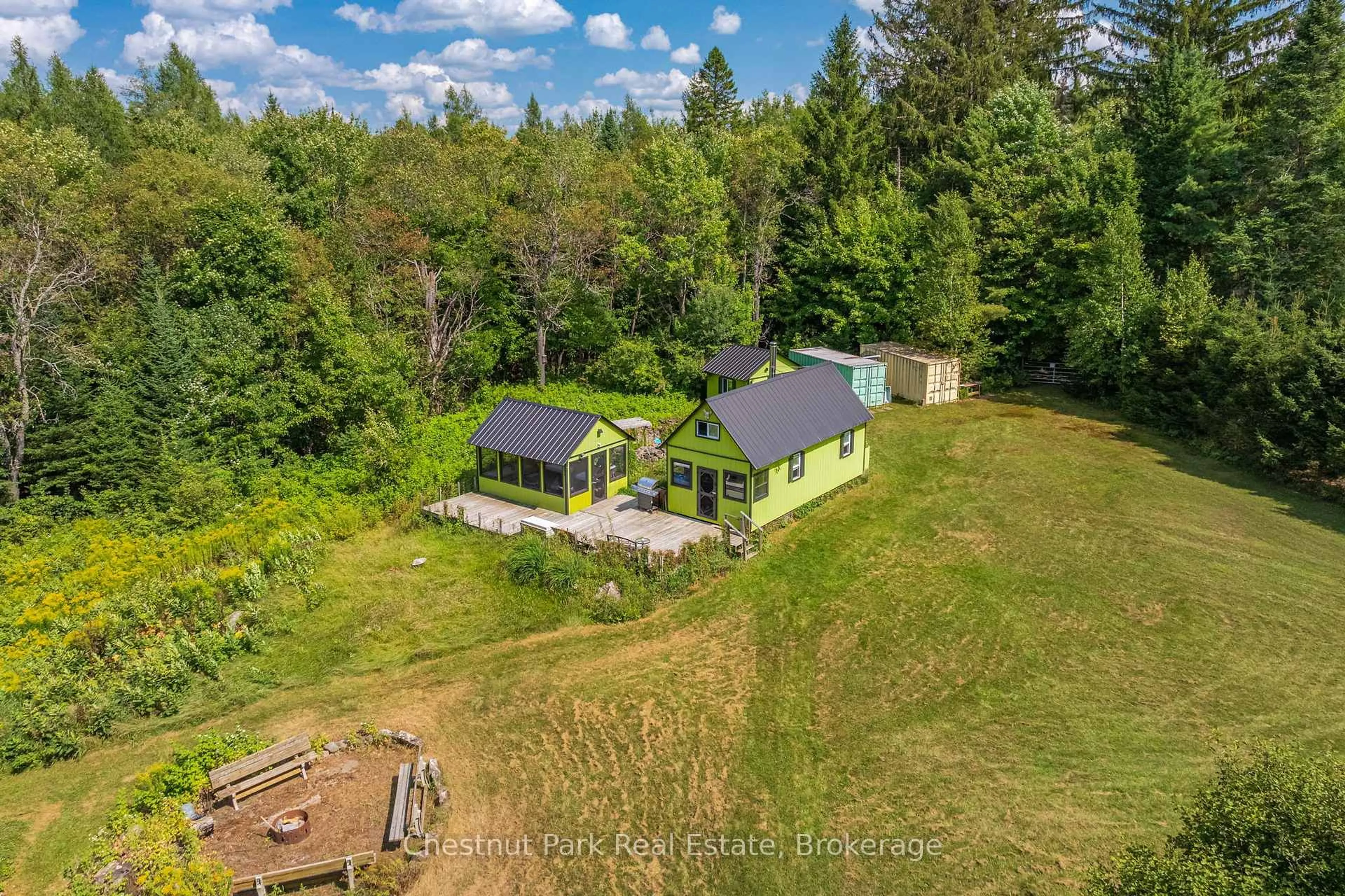 A pic from outside/outdoor area/front of a property/back of a property/a pic from drone, unknown for 2784 Axe Lake Rd, McMurrich/Monteith Ontario P0B 1M0