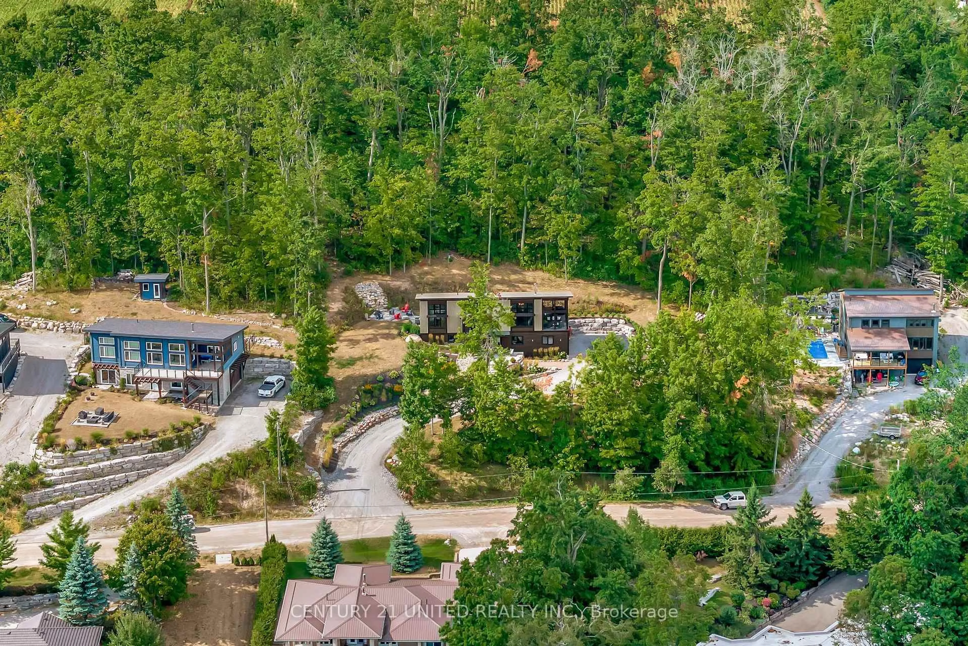 A pic from outside/outdoor area/front of a property/back of a property/a pic from drone, forest/trees view for 72 Darling Dr, Selwyn Ontario K0L 2W0