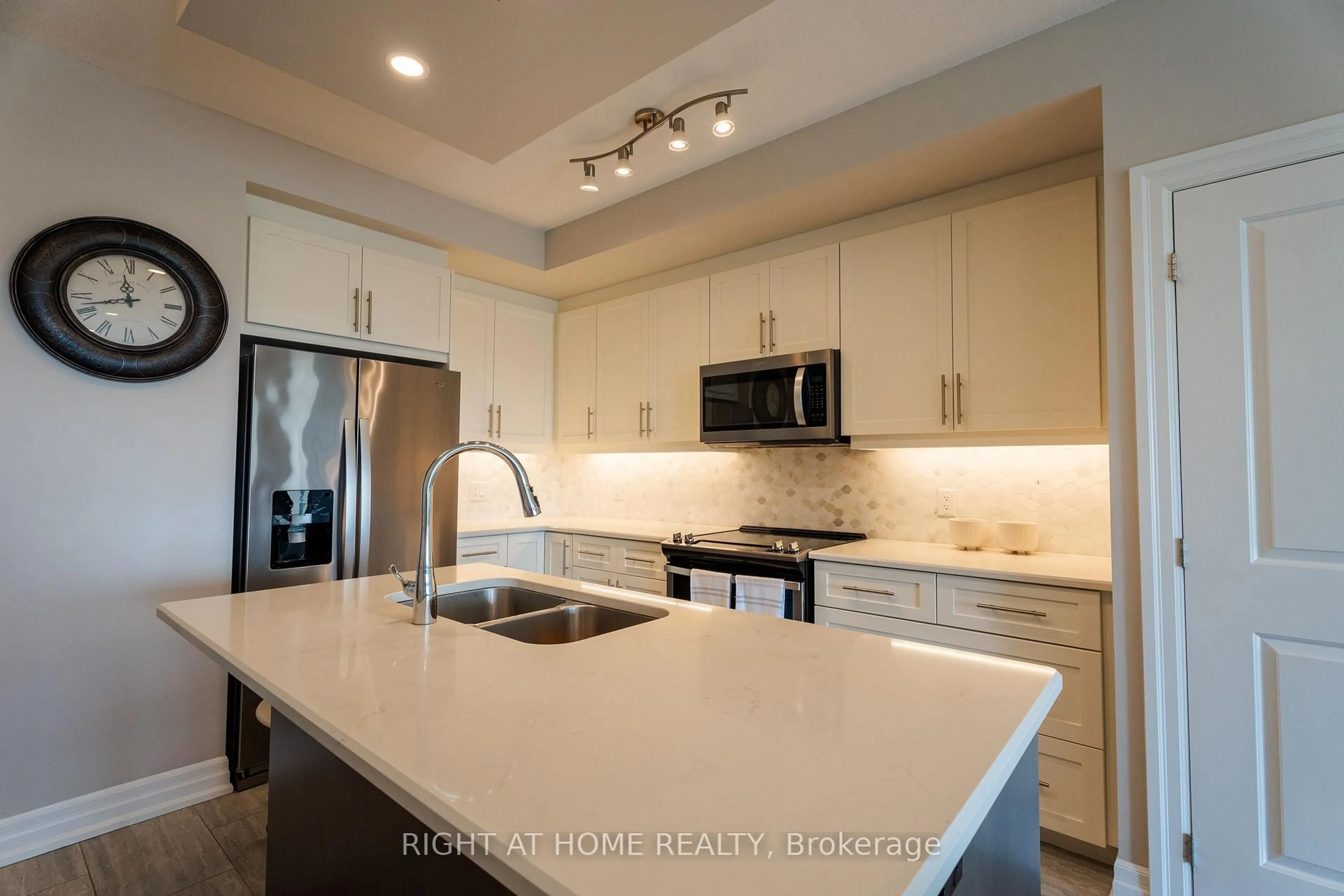 Open concept kitchen, ceramic/tile floor for 1878 Gordon St #812, Guelph Ontario N1L 0P4