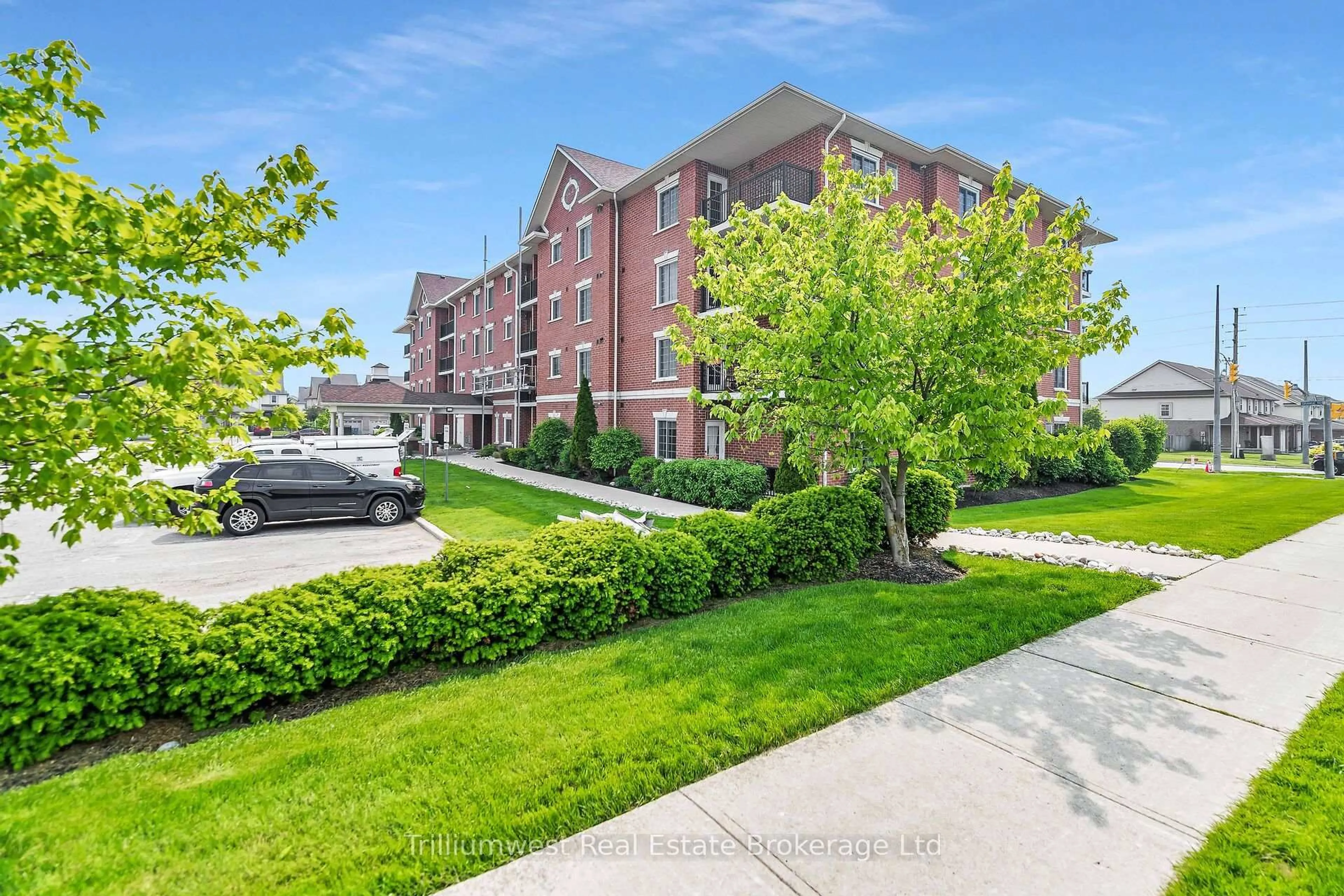 A pic from outside/outdoor area/front of a property/back of a property/a pic from drone, street for 415 Grange Rd #310, Guelph Ontario N1E 0C4