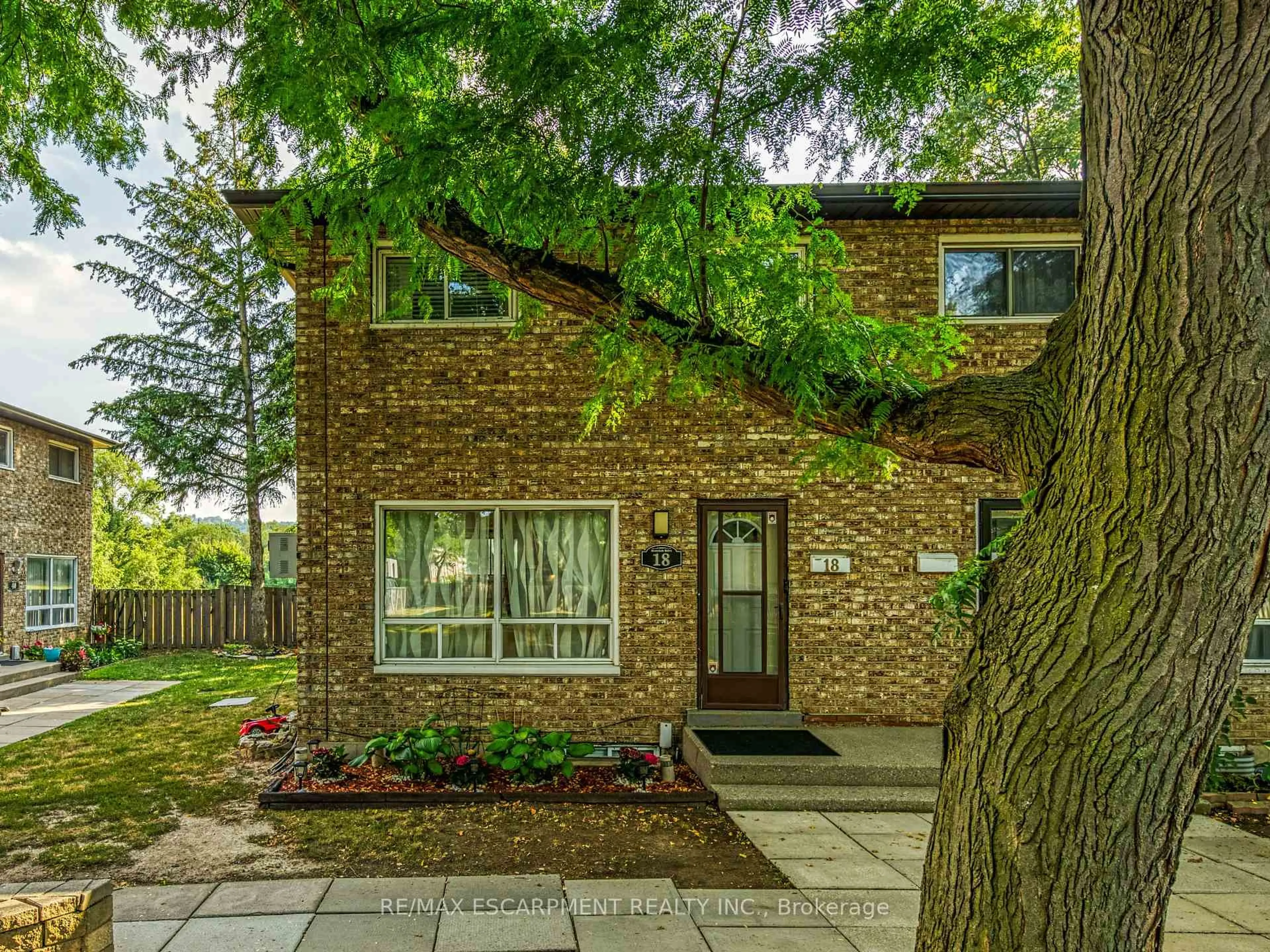 Home with brick exterior material, street for 18 Riverdale Dr, Hamilton Ontario L8E 1J8