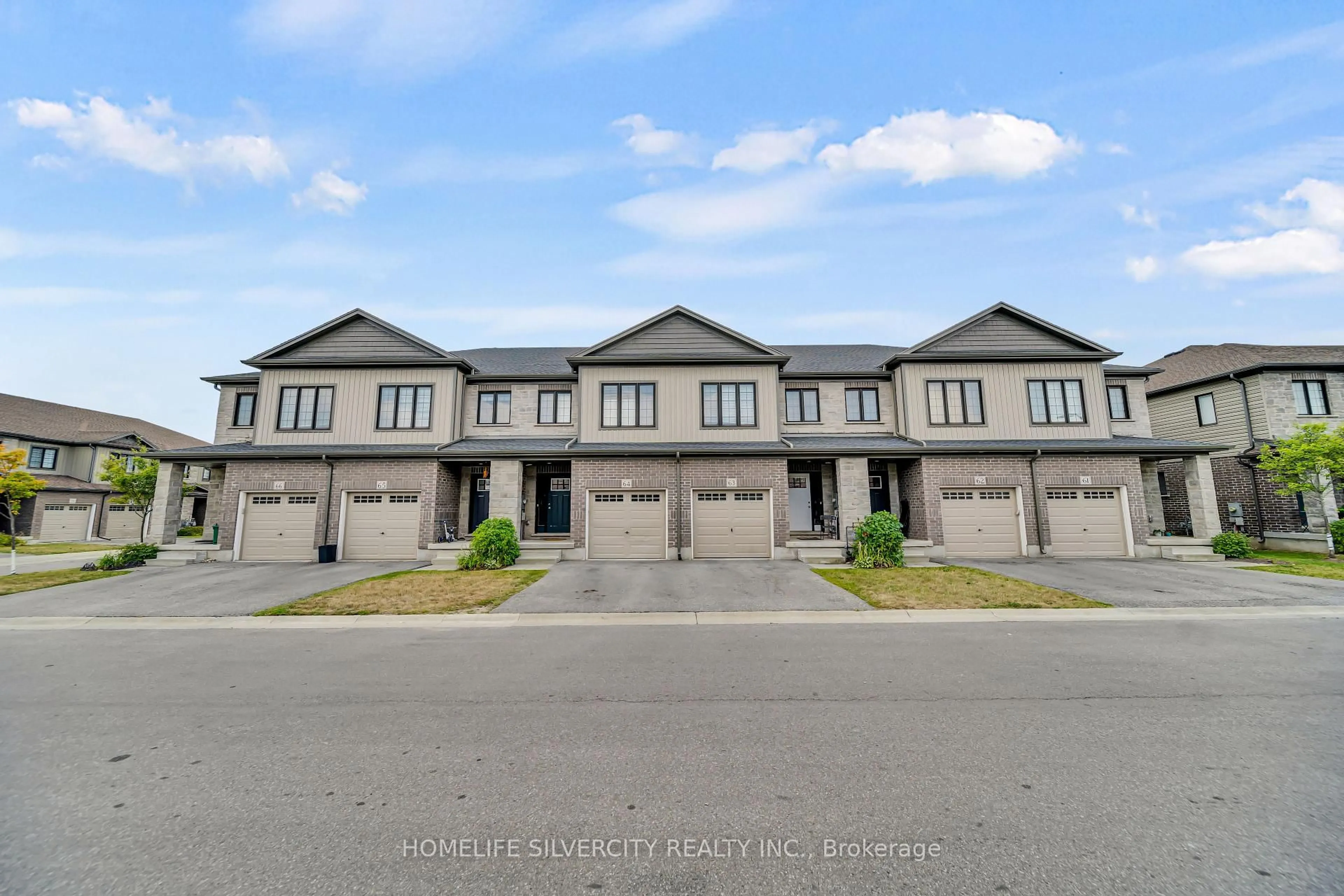 A pic from outside/outdoor area/front of a property/back of a property/a pic from drone, street for 135 Hardcastle Dr #63, Cambridge Ontario N1S 0B6
