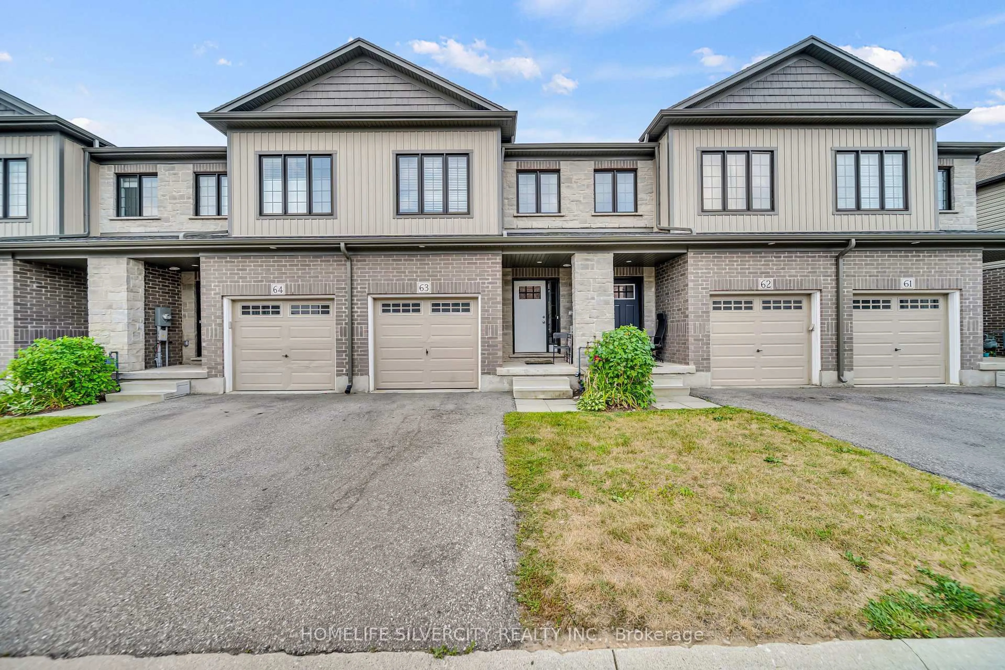 Home with brick exterior material, street for 135 Hardcastle Dr #63, Cambridge Ontario N1S 0B6