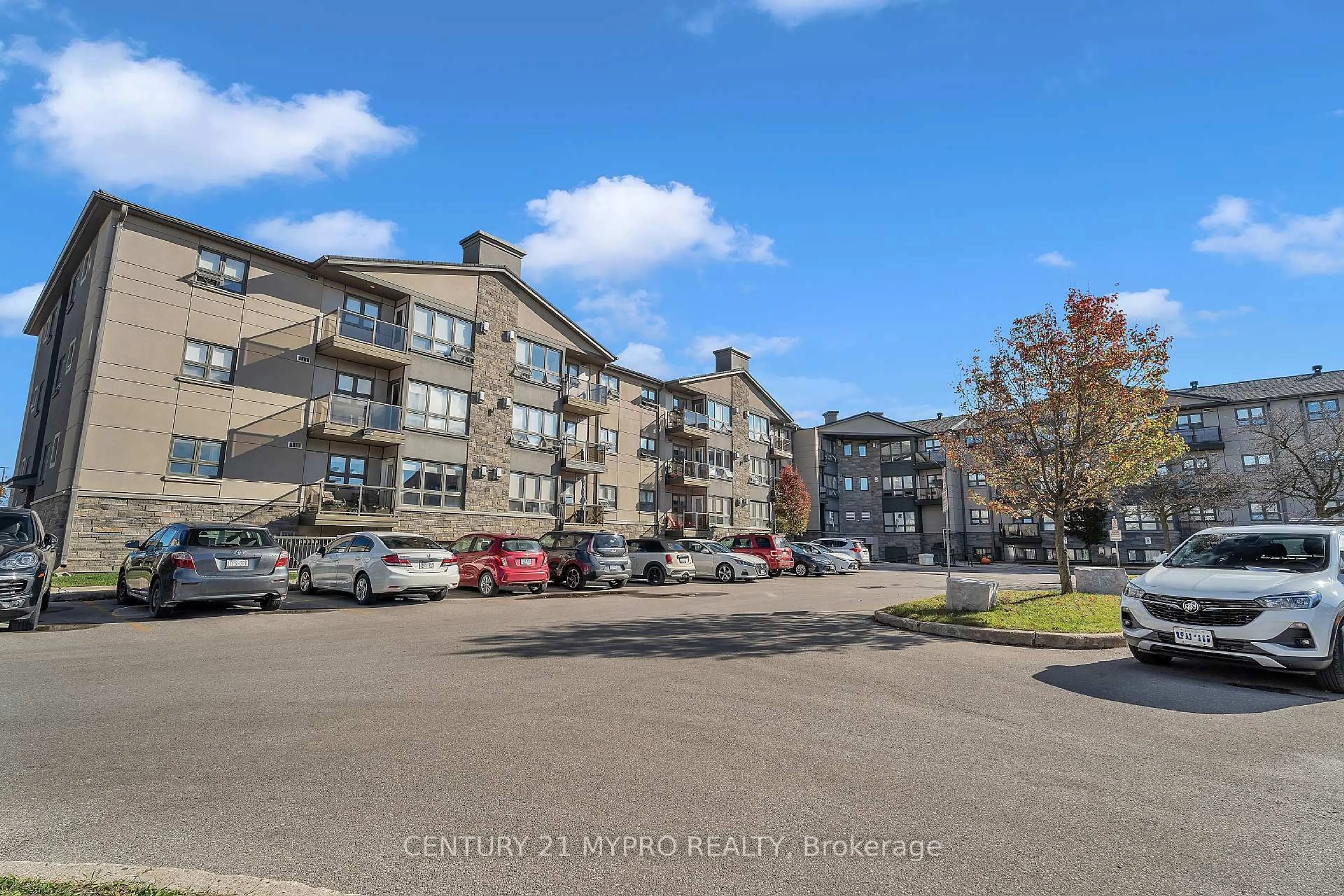 A pic from outside/outdoor area/front of a property/back of a property/a pic from drone, unknown for 1 Jacksway Cres #410, London North Ontario N5X 3T5