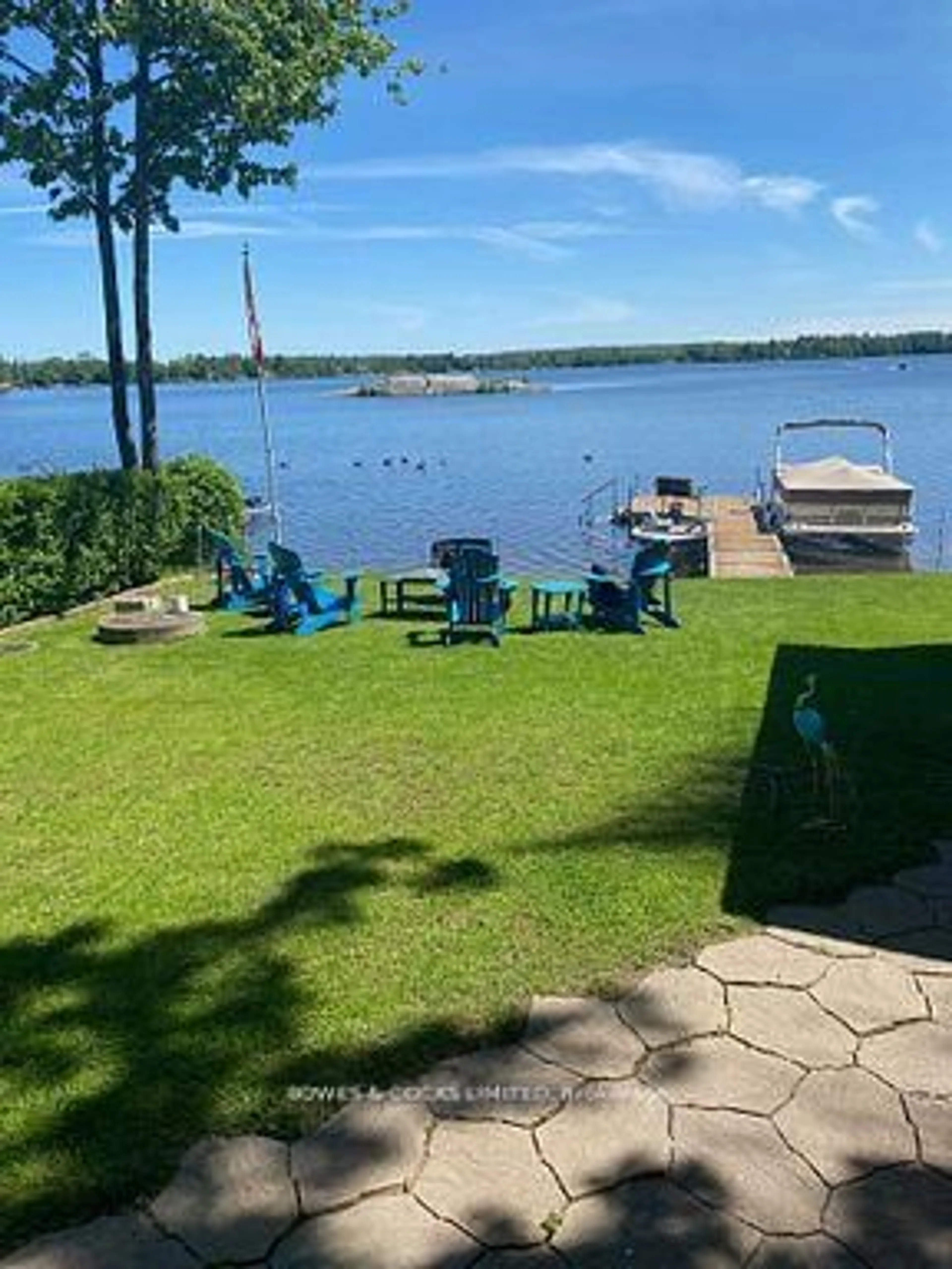 A pic from outside/outdoor area/front of a property/back of a property/a pic from drone, water/lake/river/ocean view for 31 Fire Route 28, North Kawartha Ontario K0L 2H0
