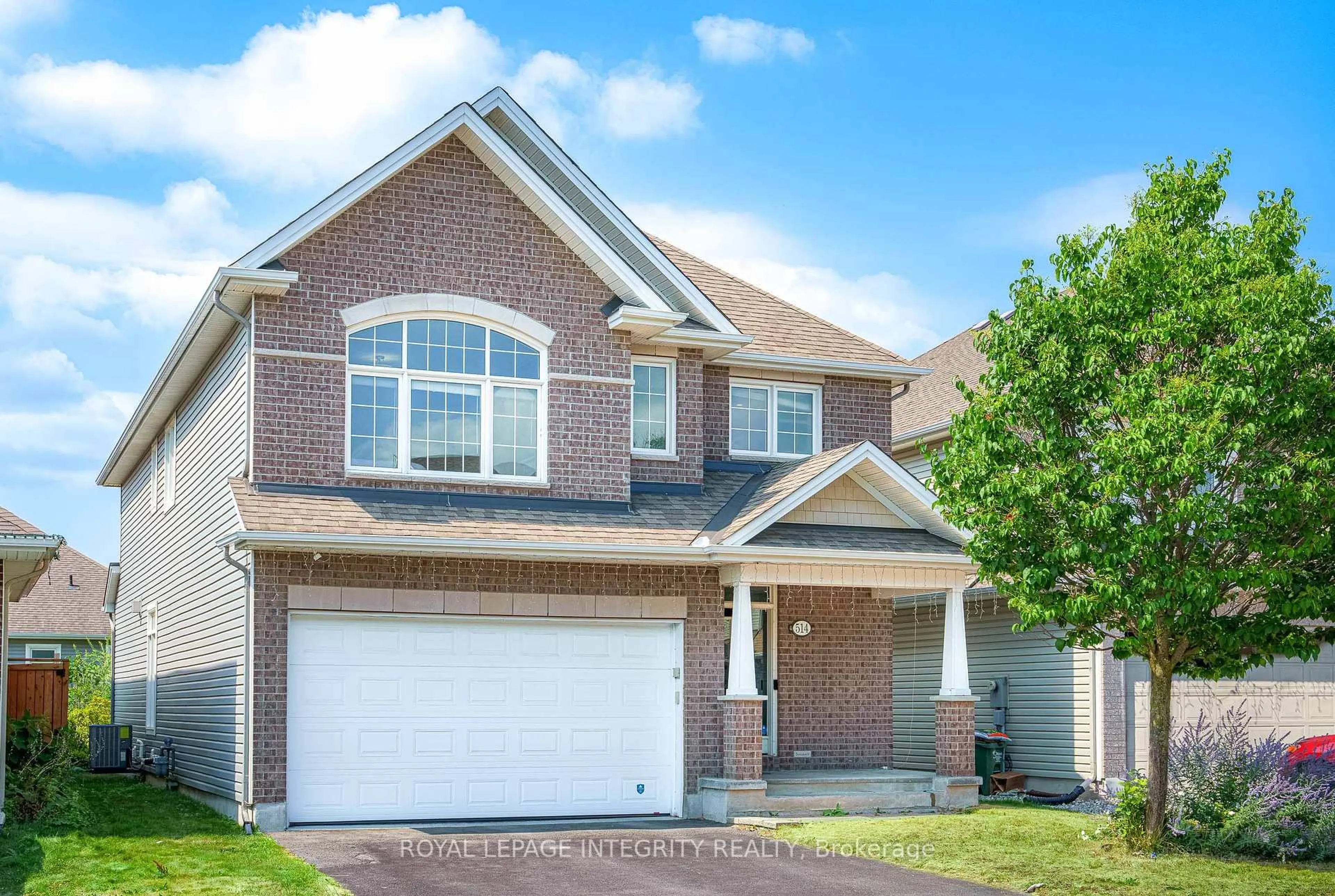 Home with brick exterior material, street for 514 Carina Cres, Ottawa Ontario K2J 0Z4