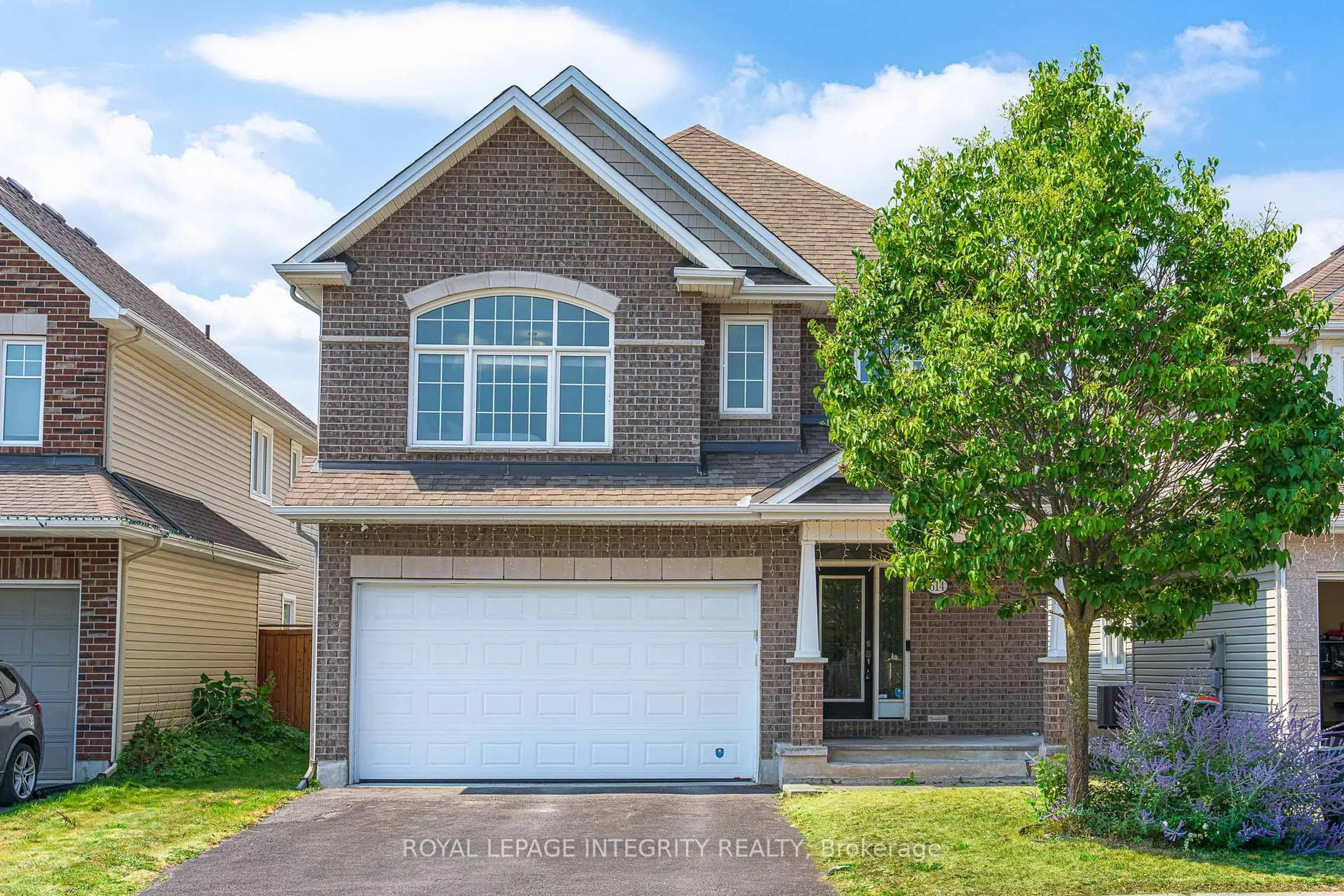 Home with brick exterior material, street for 514 Carina Cres, Ottawa Ontario K2J 0Z4