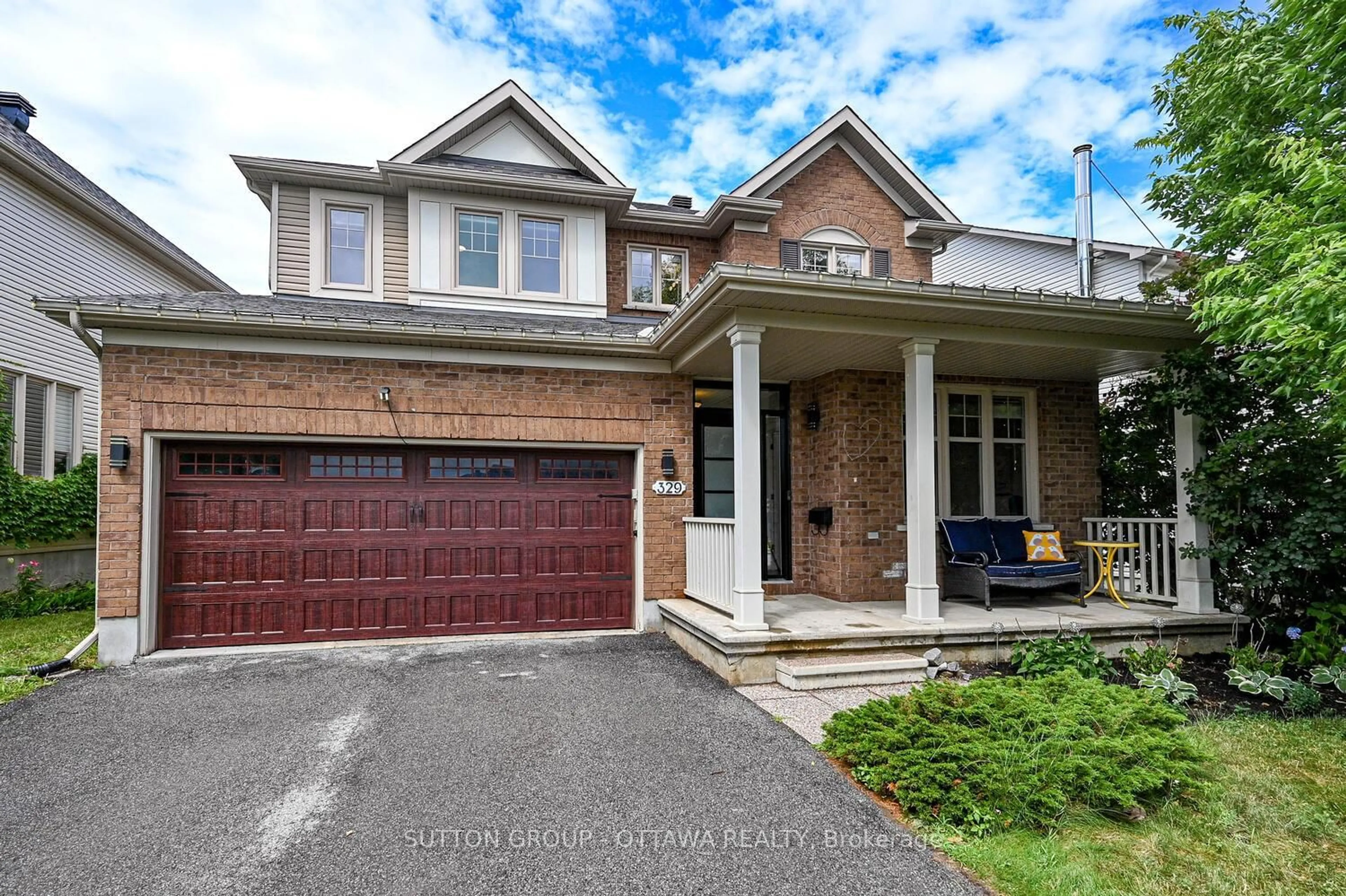 Home with brick exterior material, street for 329 West Ridge Dr, Stittsville Ontario K2S 2G7