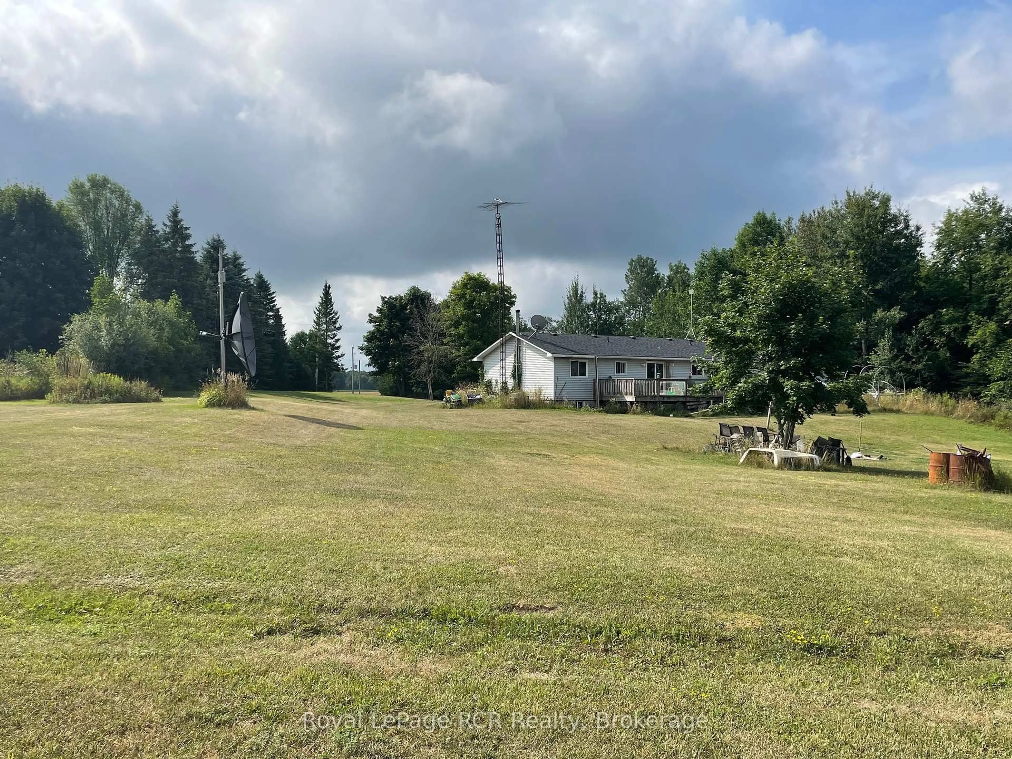 A pic from outside/outdoor area/front of a property/back of a property/a pic from drone, mountain view for 062353 Road 63 Rd, West Grey Ontario N0G 2L0