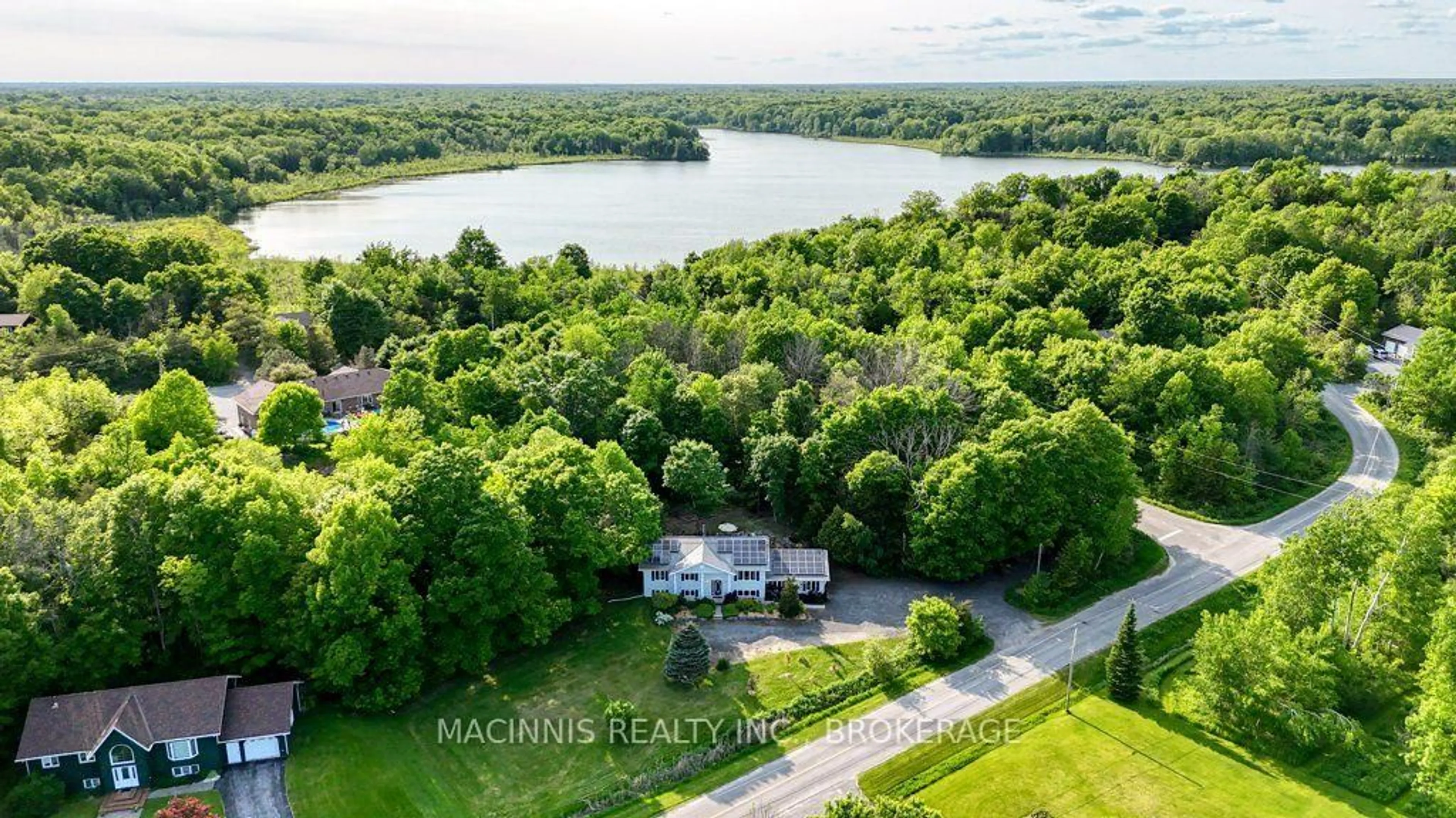 A pic from outside/outdoor area/front of a property/back of a property/a pic from drone, water/lake/river/ocean view for 6187 REVELL Rd, Verona Ontario K0H 2W0