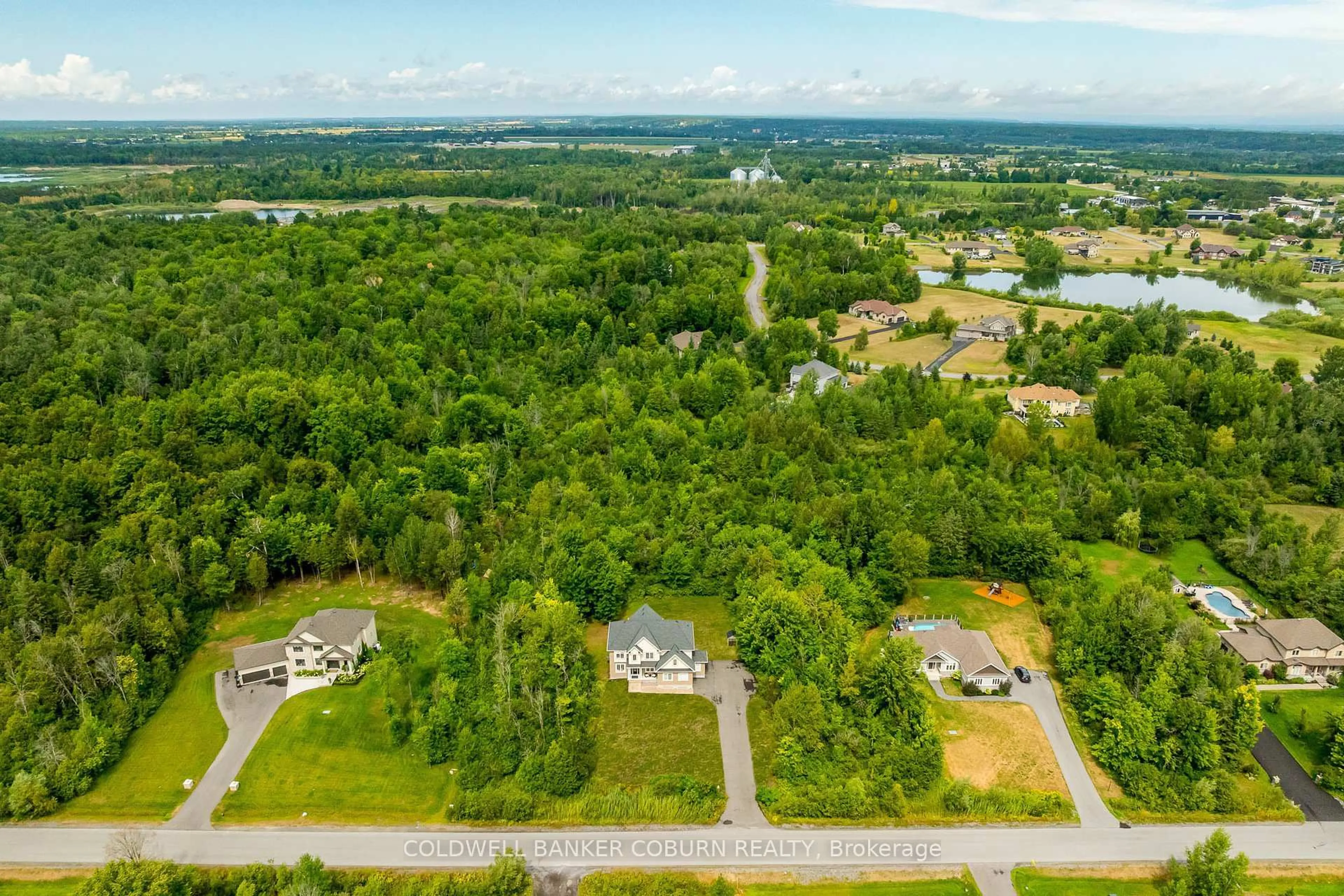 A pic from outside/outdoor area/front of a property/back of a property/a pic from drone, water/lake/river/ocean view for 549 Osmond Daley Dr, Carp Ontario K0A 1L0