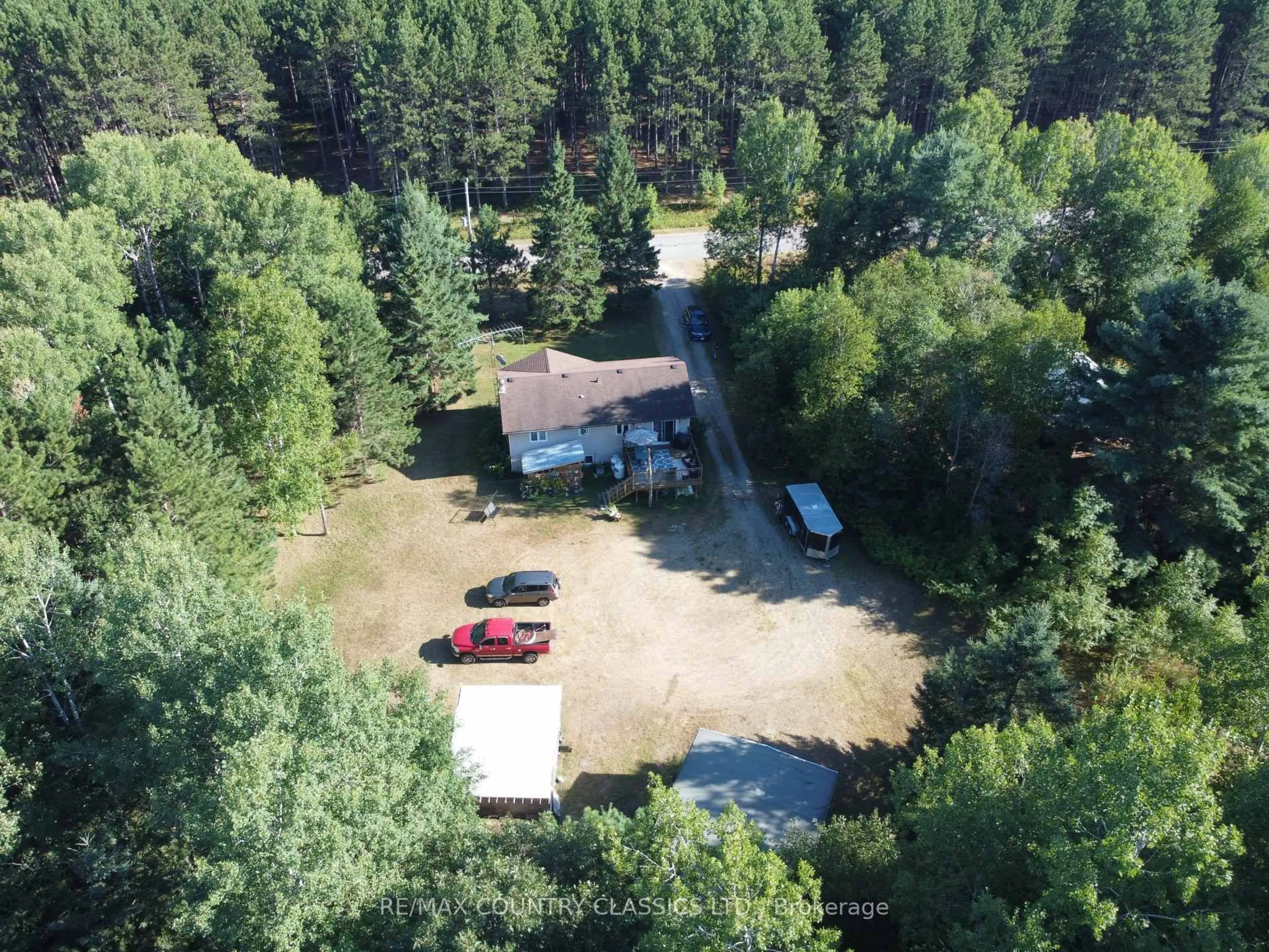 A pic from outside/outdoor area/front of a property/back of a property/a pic from drone, forest/trees view for 1632 Division Rd, Killaloe Ontario K0J 2A0
