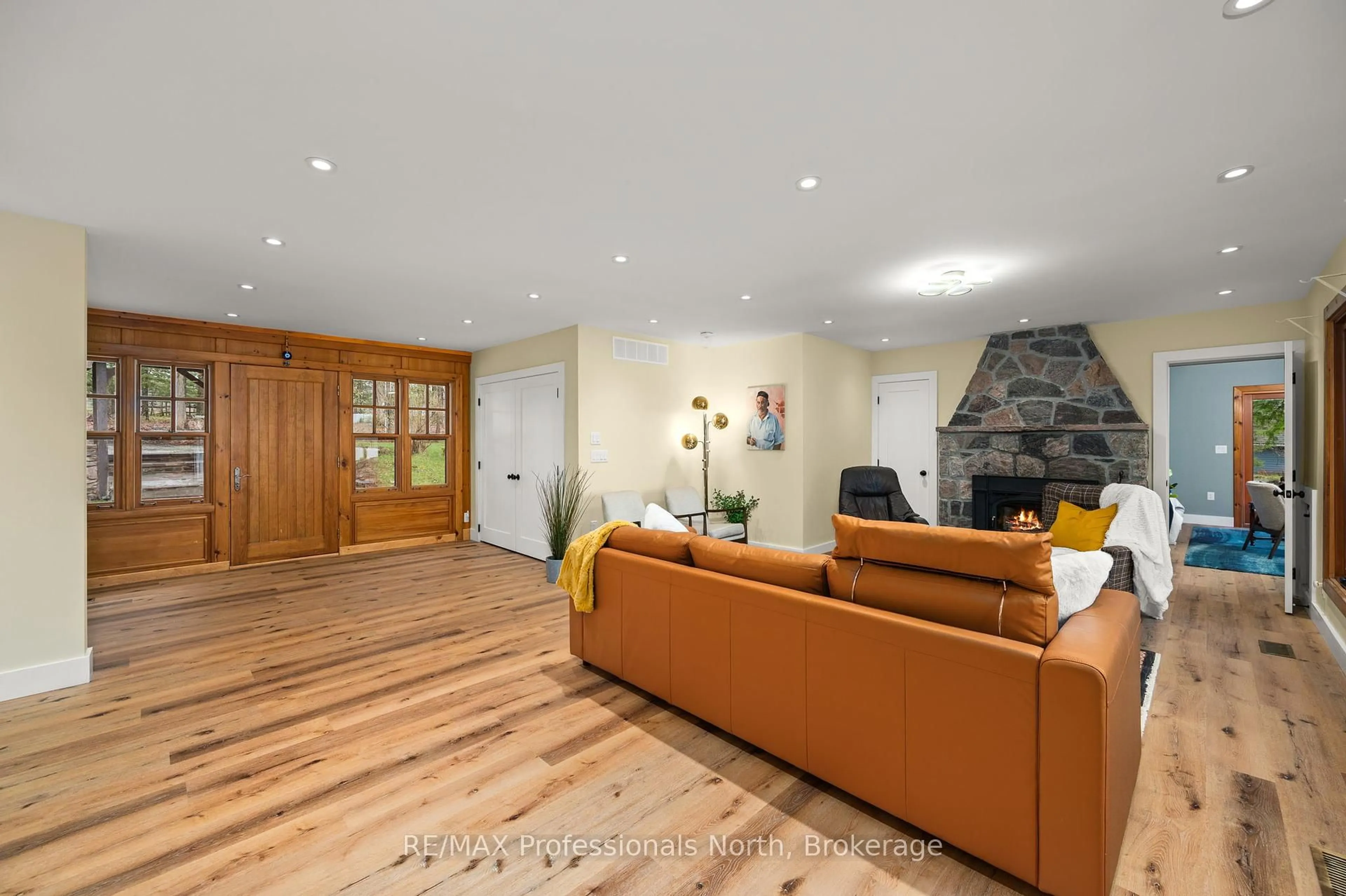 Living room with furniture, wood/laminate floor for 1073 Grass Lake Rd, Dysart et al Ontario K0M 1S0