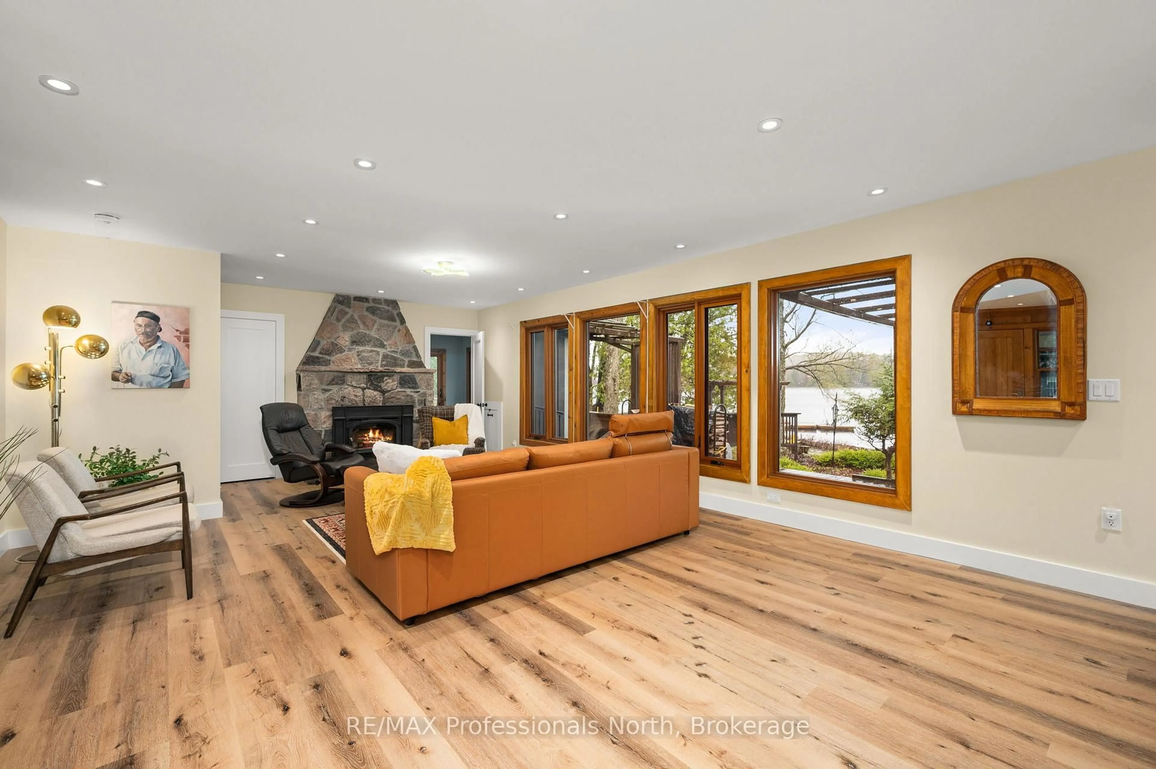 Living room with furniture, wood/laminate floor for 1073 Grass Lake Rd, Dysart et al Ontario K0M 1S0