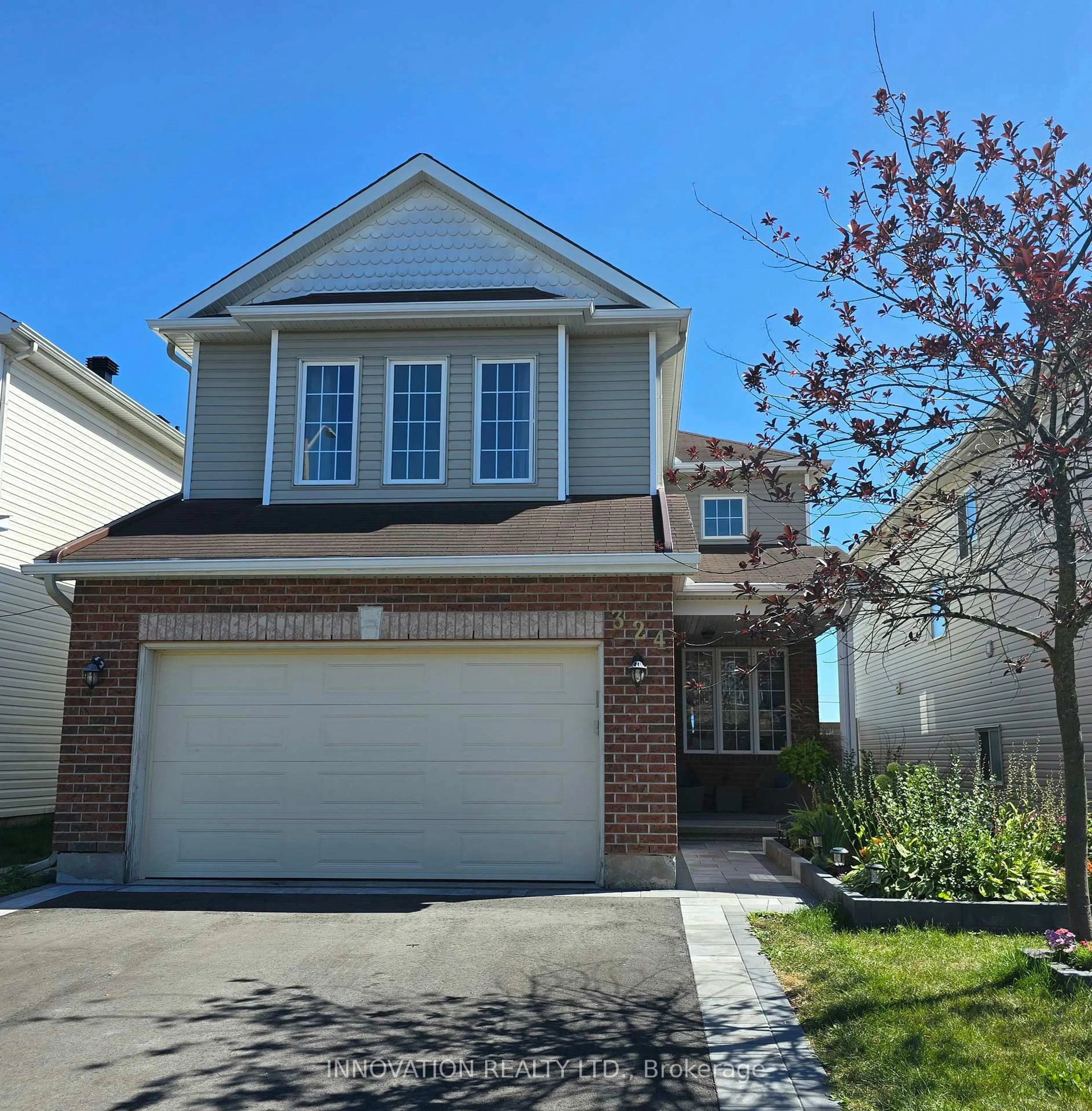 Home with vinyl exterior material, street for 324 Rustic Hills Cres, Ottawa Ontario K4A 5A8