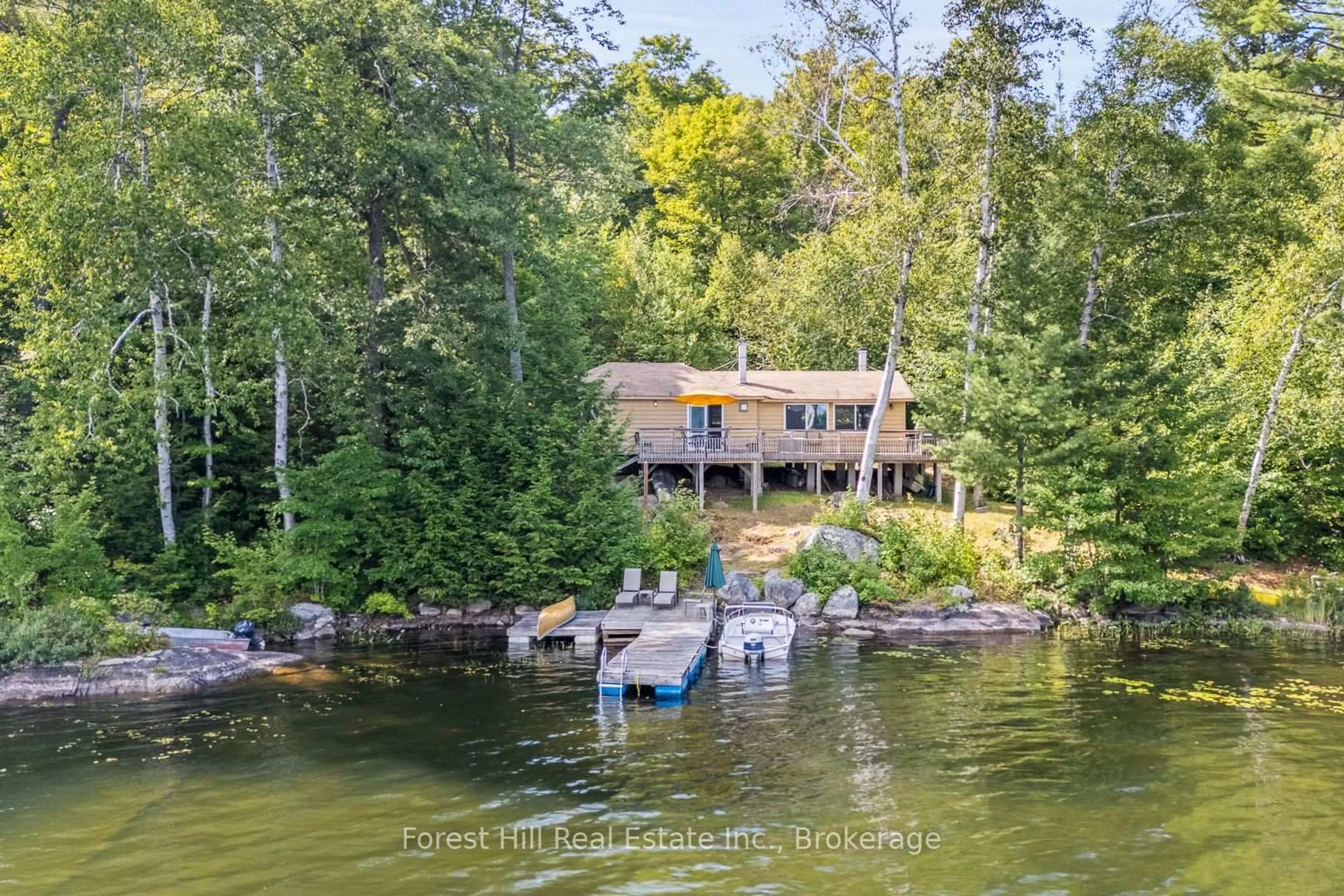 A pic from outside/outdoor area/front of a property/back of a property/a pic from drone, water/lake/river/ocean view for 1277 Causeway Dr, Algonquin Highlands Ontario P0A 1E0