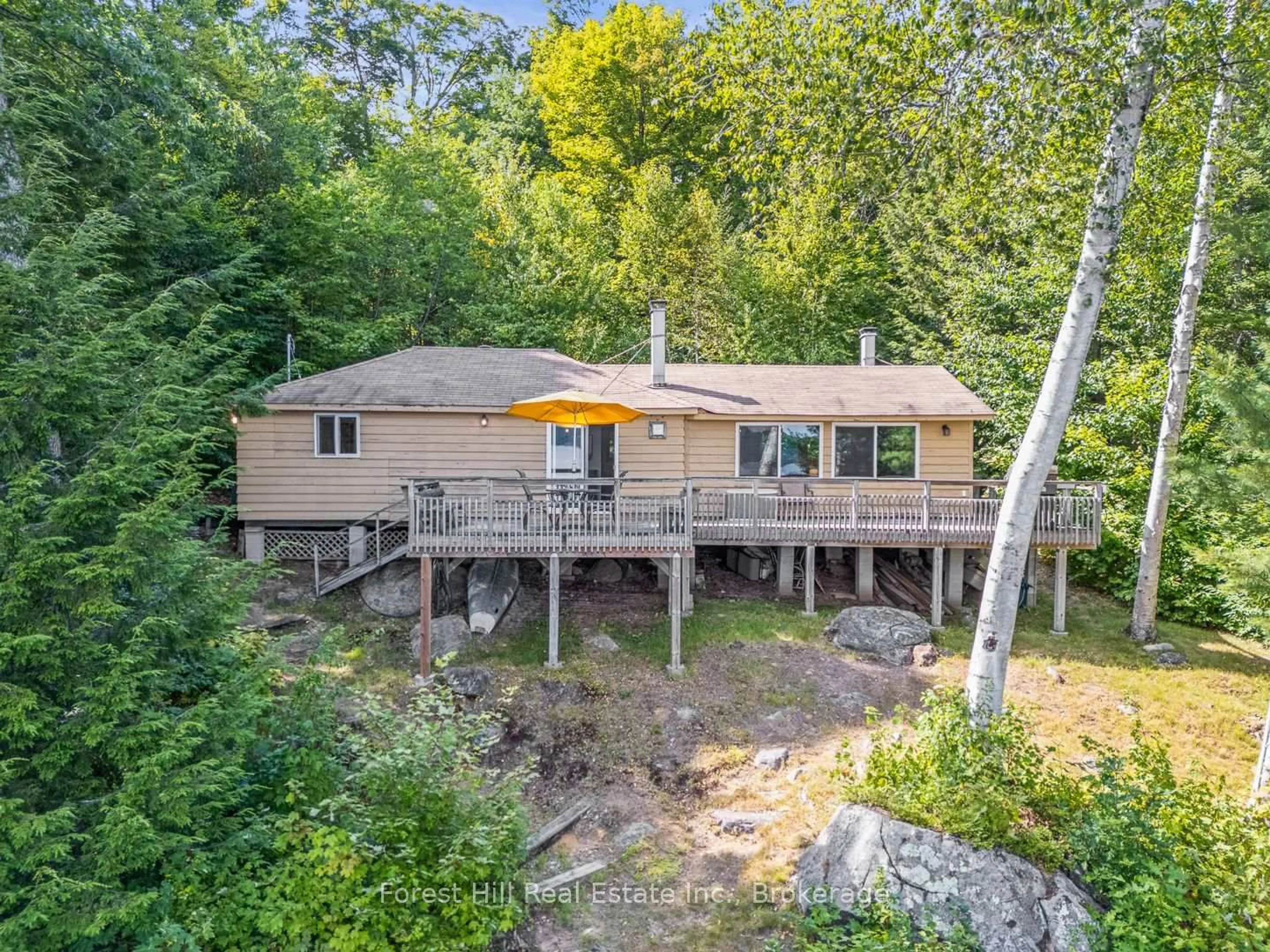 A pic from outside/outdoor area/front of a property/back of a property/a pic from drone, water/lake/river/ocean view for 1277 Causeway Dr, Algonquin Highlands Ontario P0A 1E0