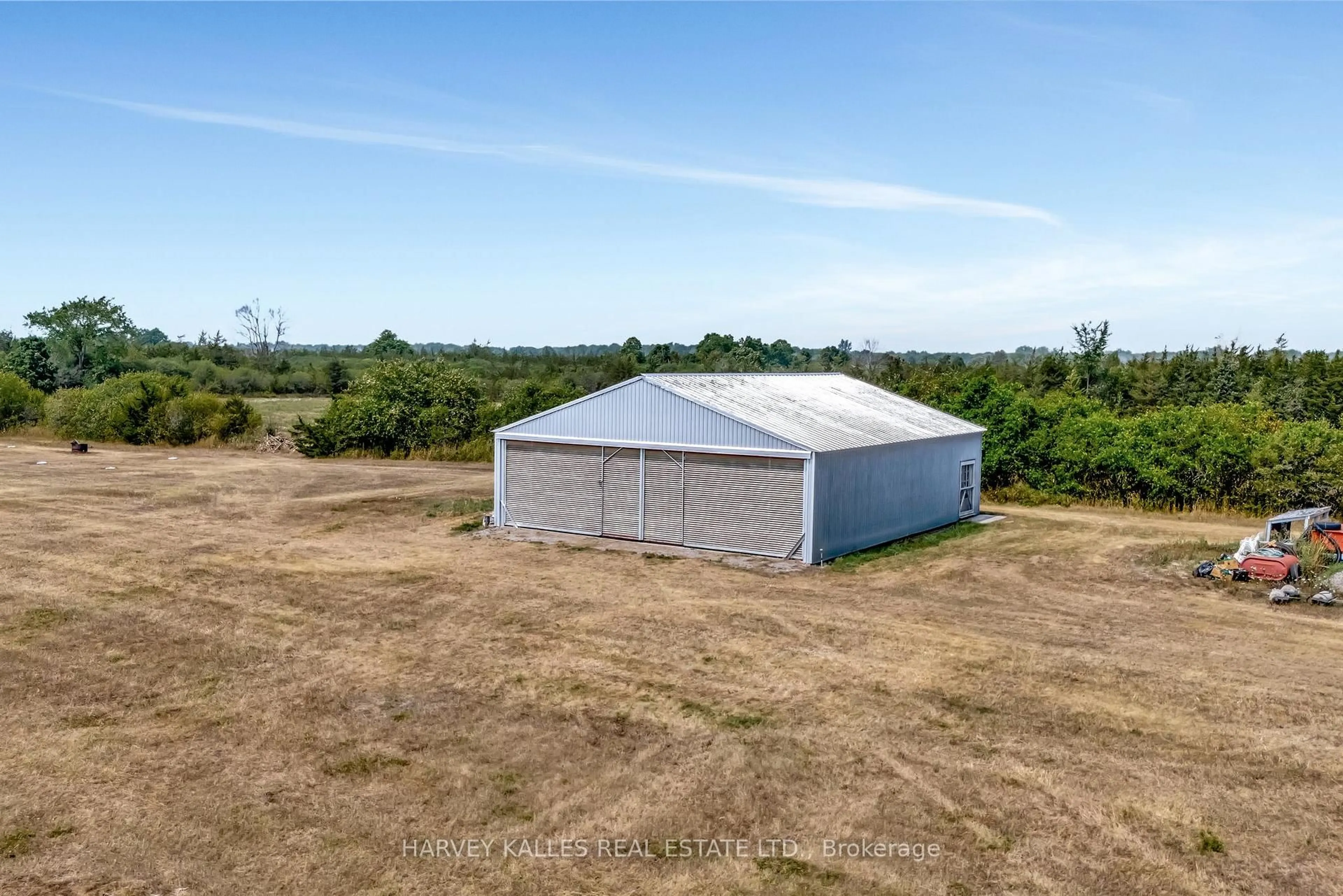 A pic from outside/outdoor area/front of a property/back of a property/a pic from drone, building for 130 Easterbrook Rd, Prince Edward County Ontario K0K 1P0