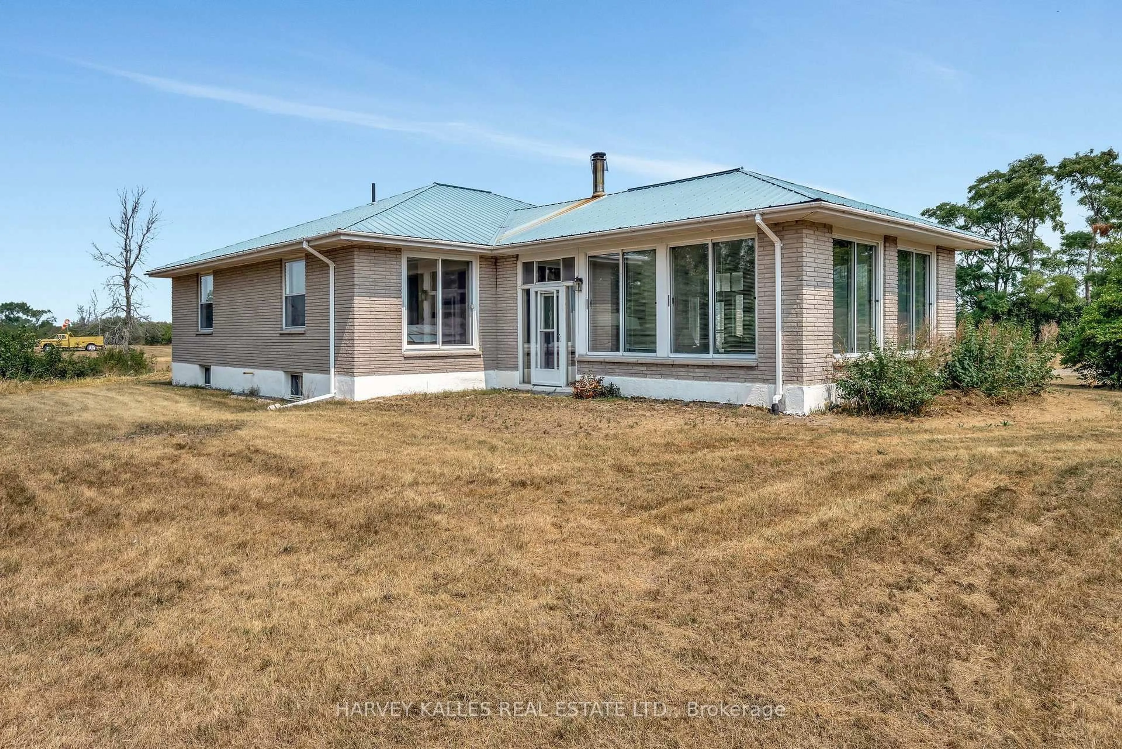 A pic from outside/outdoor area/front of a property/back of a property/a pic from drone, building for 130 Easterbrook Rd, Prince Edward County Ontario K0K 1P0