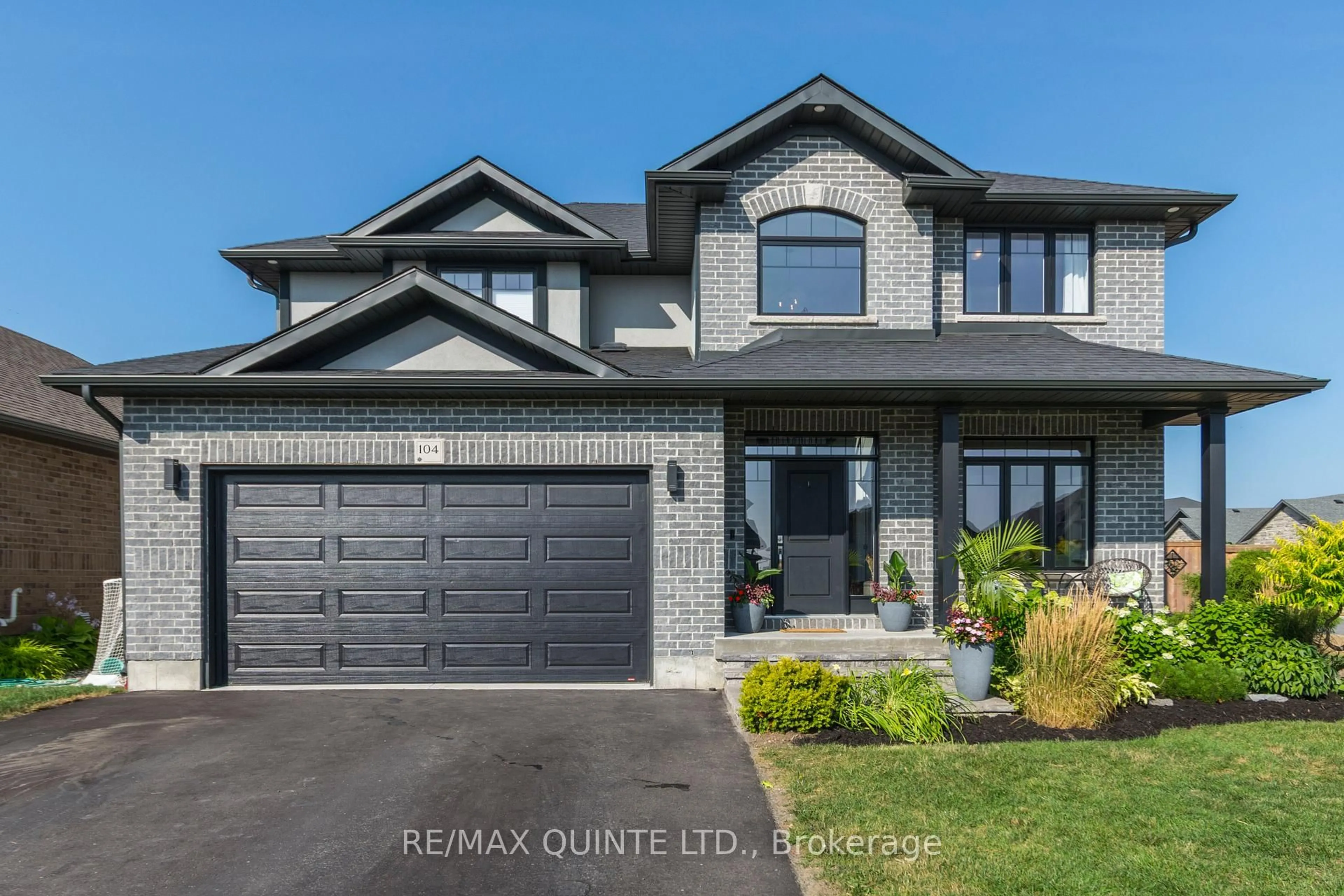Home with brick exterior material, street for 104 Hampton Ridge Dr, Belleville Ontario K8N 0E6
