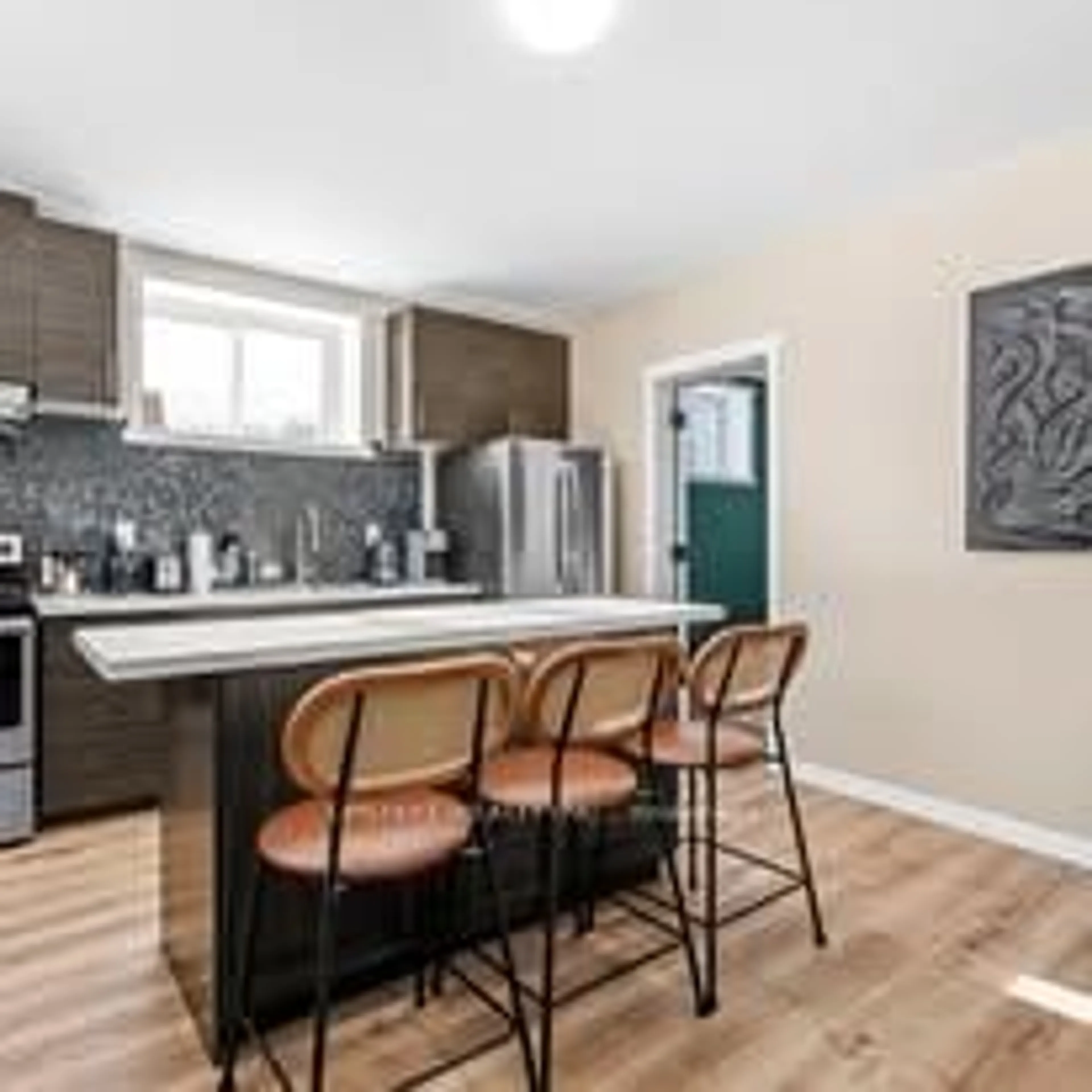 Open concept kitchen, wood/laminate floor for 423474 6 Concession, West Grey Ontario N0C 1H0