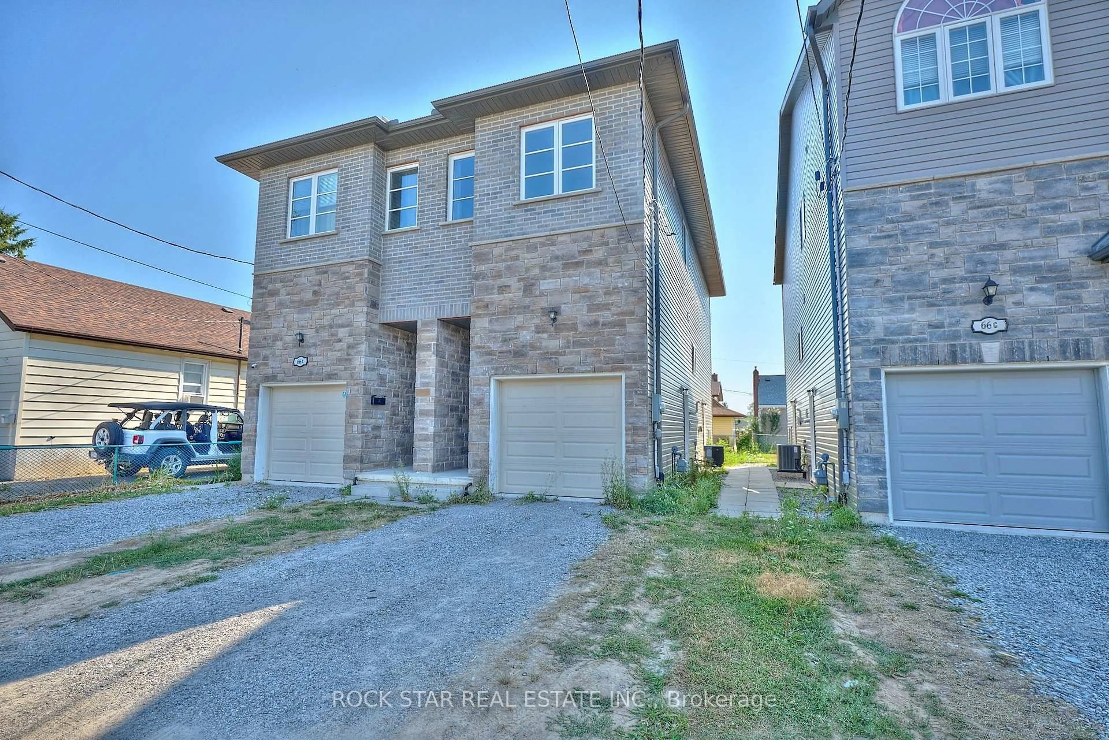Home with brick exterior material, street for 66B Battle St, Thorold Ontario L2V 3W7