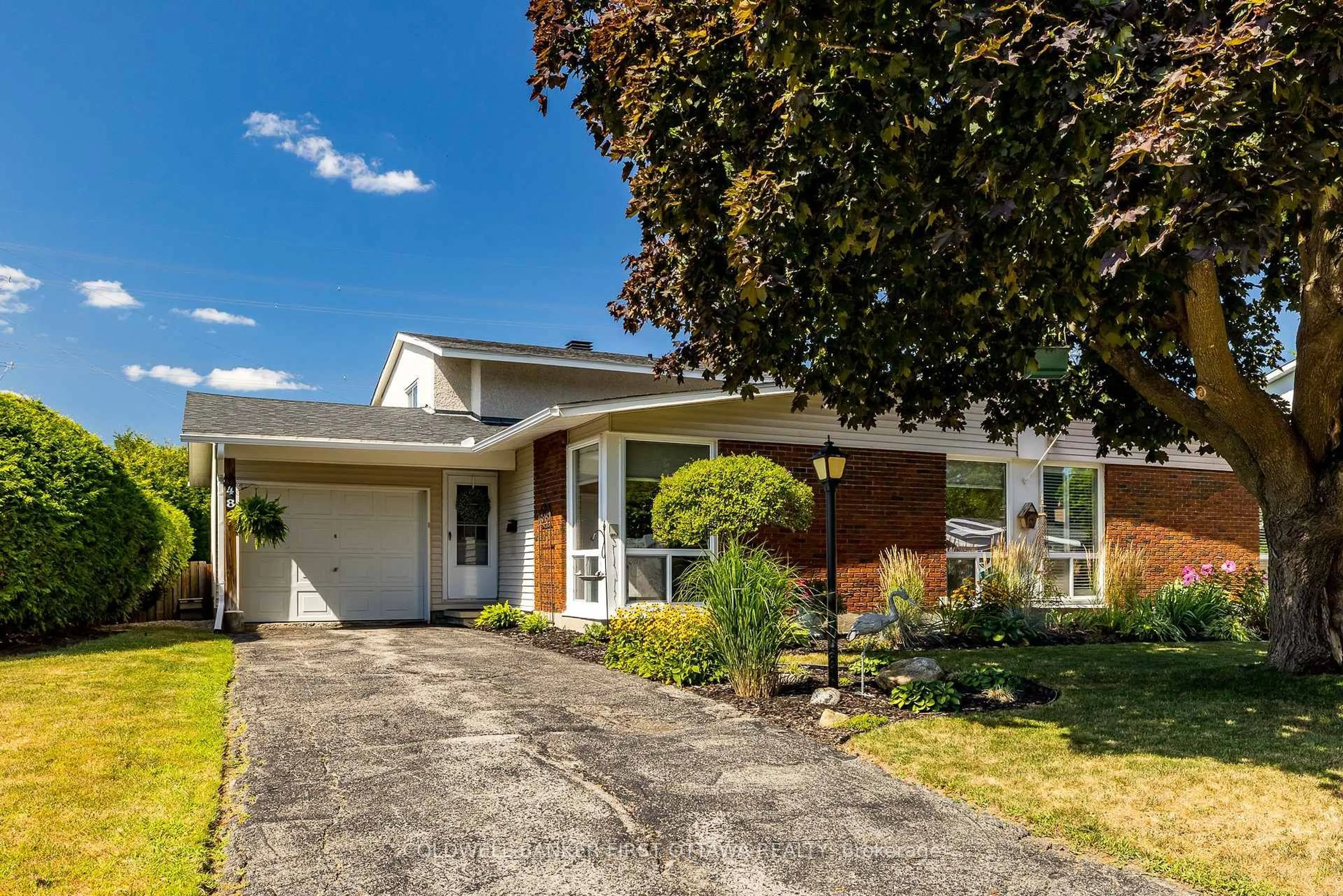 Home with vinyl exterior material, street for 48 DOWNSVIEW Cres, Ottawa Ontario K2G 0A5