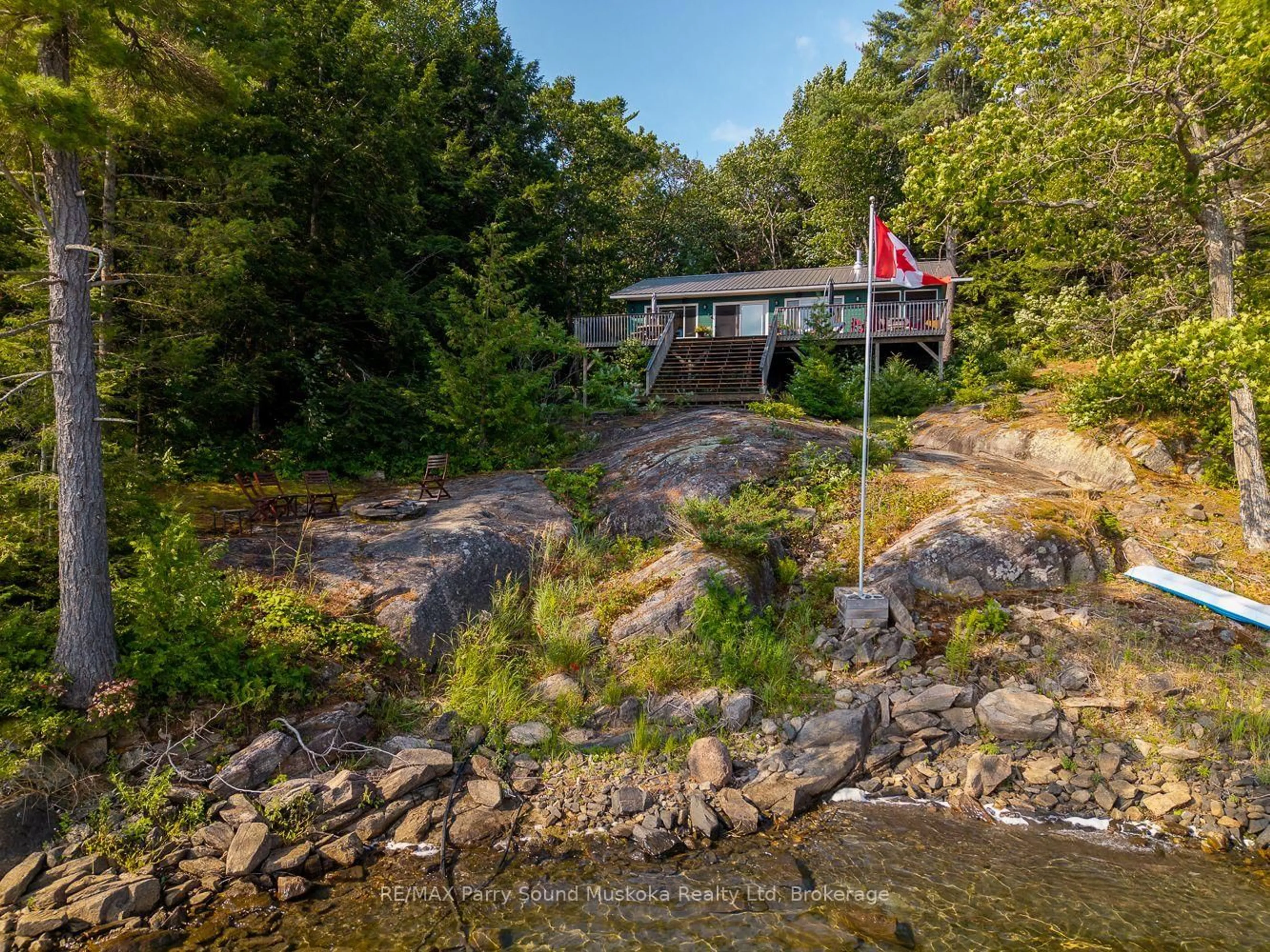 A pic from outside/outdoor area/front of a property/back of a property/a pic from drone, water/lake/river/ocean view for 47 Island 65c Island, Carling Ontario P0G 1G0