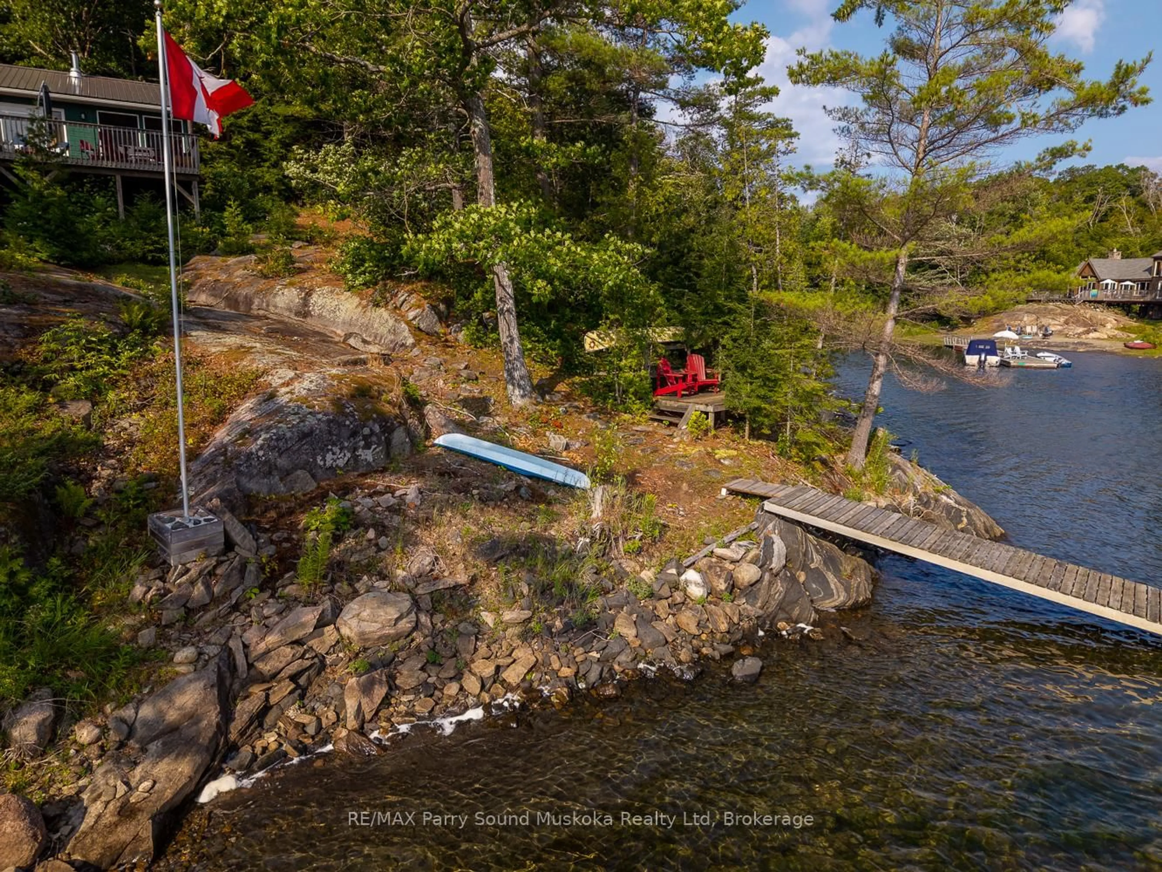A pic from outside/outdoor area/front of a property/back of a property/a pic from drone, water/lake/river/ocean view for 47 Island 65c Island, Carling Ontario P0G 1G0