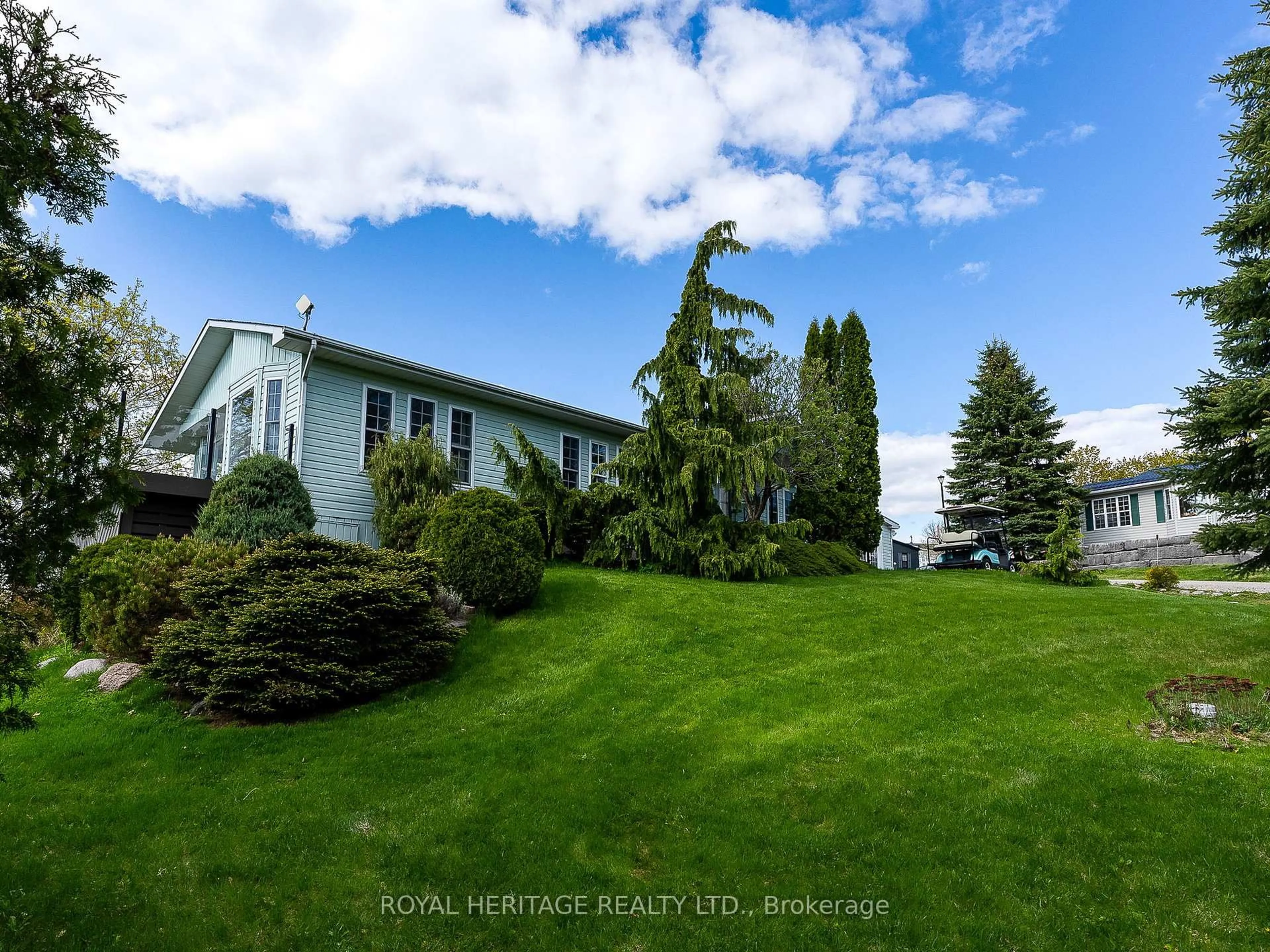 A pic from outside/outdoor area/front of a property/back of a property/a pic from drone, water/lake/river/ocean view for 6916 County Rd 18 Rd #700, Alnwick/Haldimand Ontario K0K 2X0