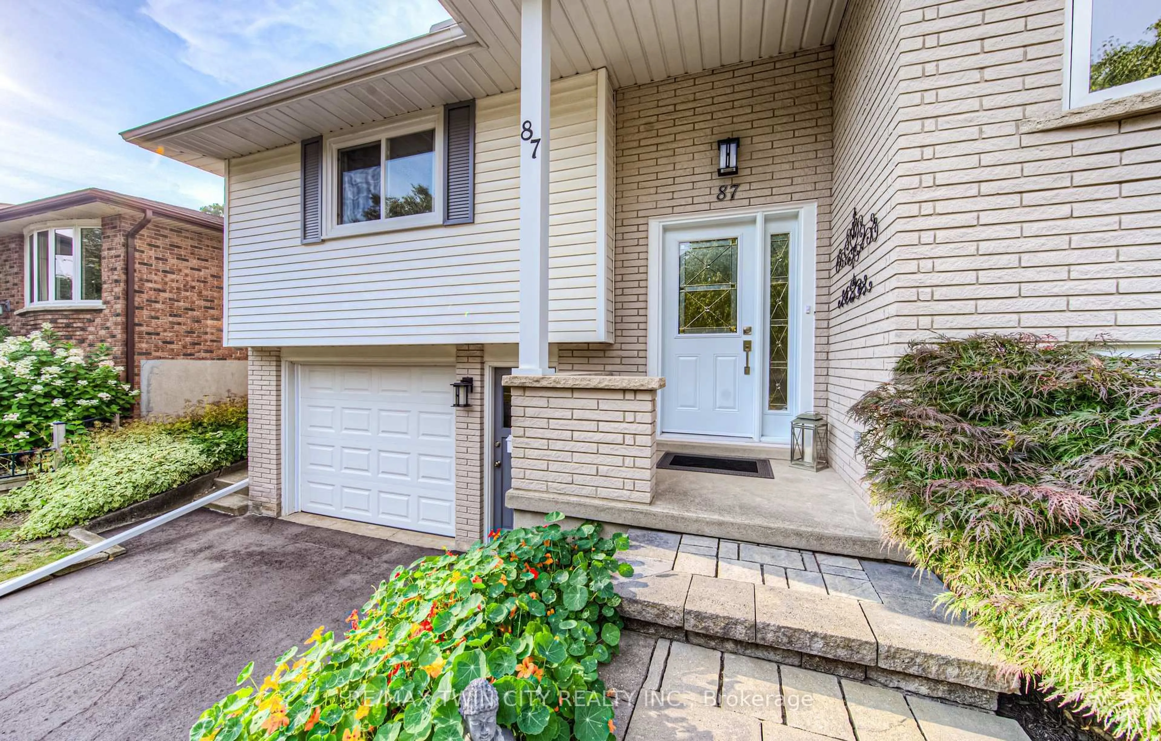 Home with brick exterior material, street for 87 Radcliffe Dr, Kitchener Ontario N2E 1Y7