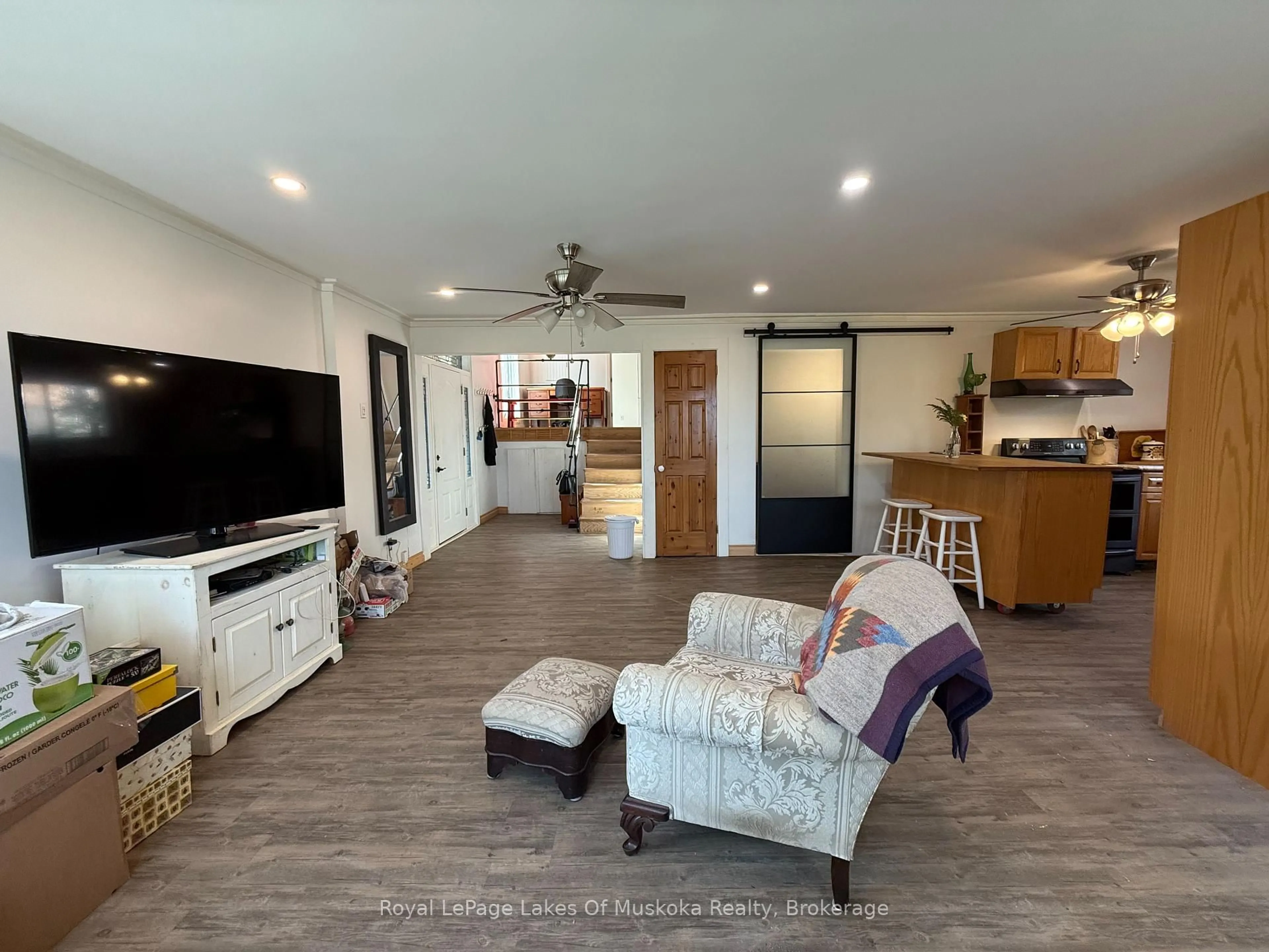 Living room with furniture, unknown for 48 Kitchen Rd, Huntsville Ontario P1H 2K8