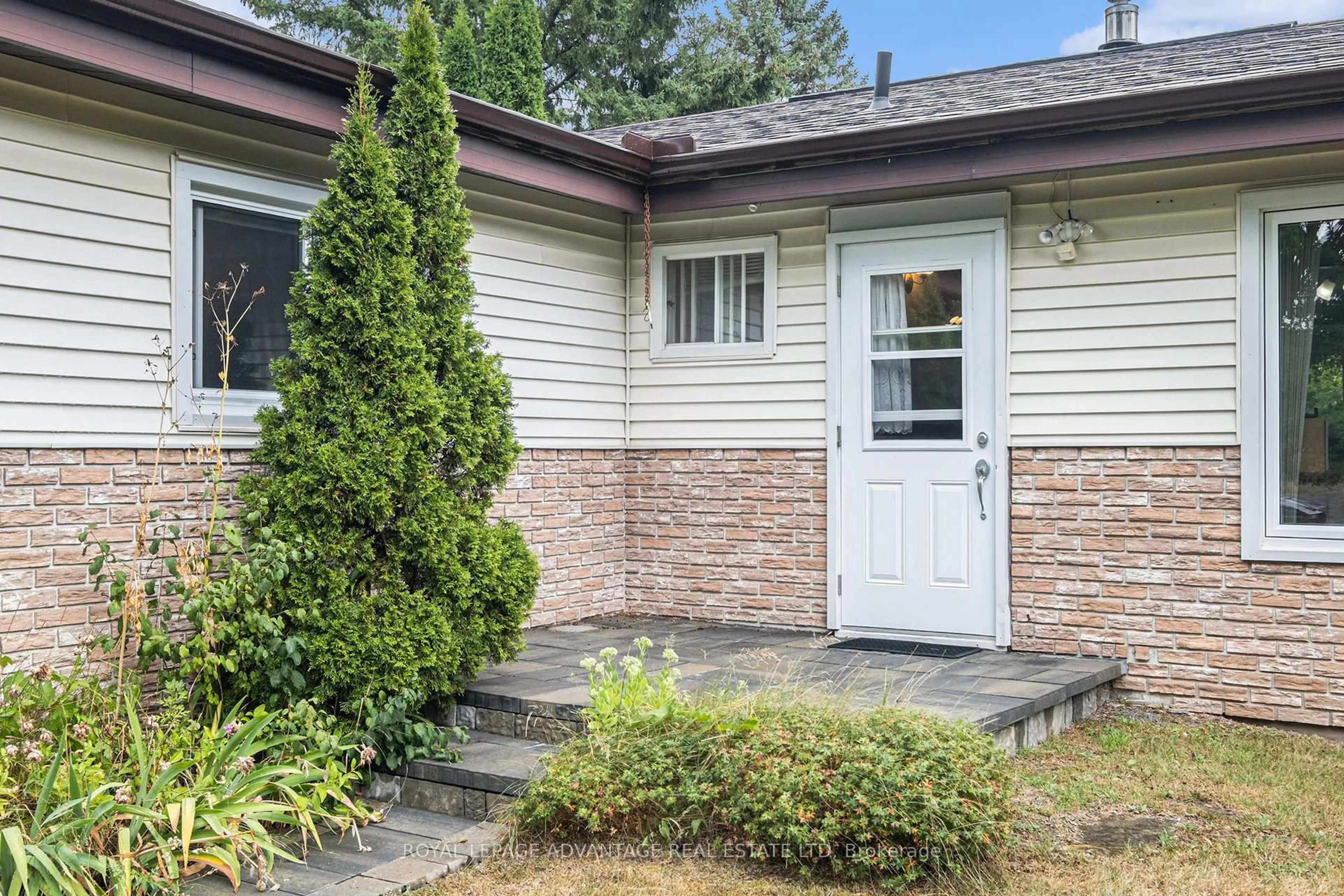 Home with vinyl exterior material, street for 77 Golf Club Rd, Rideau Lakes Ontario K7A 4S5