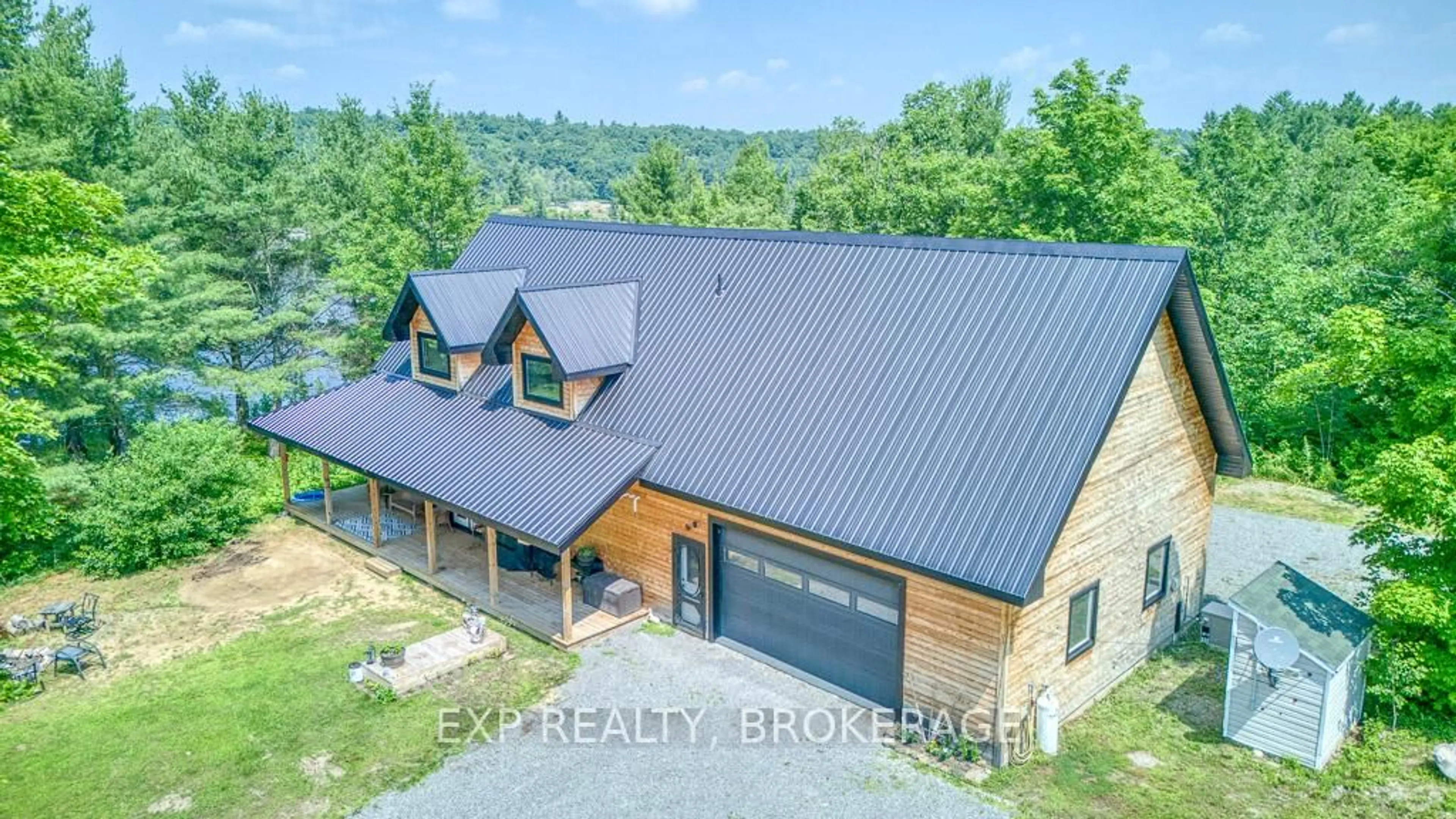 A pic from outside/outdoor area/front of a property/back of a property/a pic from drone, building for 1249 Waters Edge Lane, Arden Ontario K0H 1B0