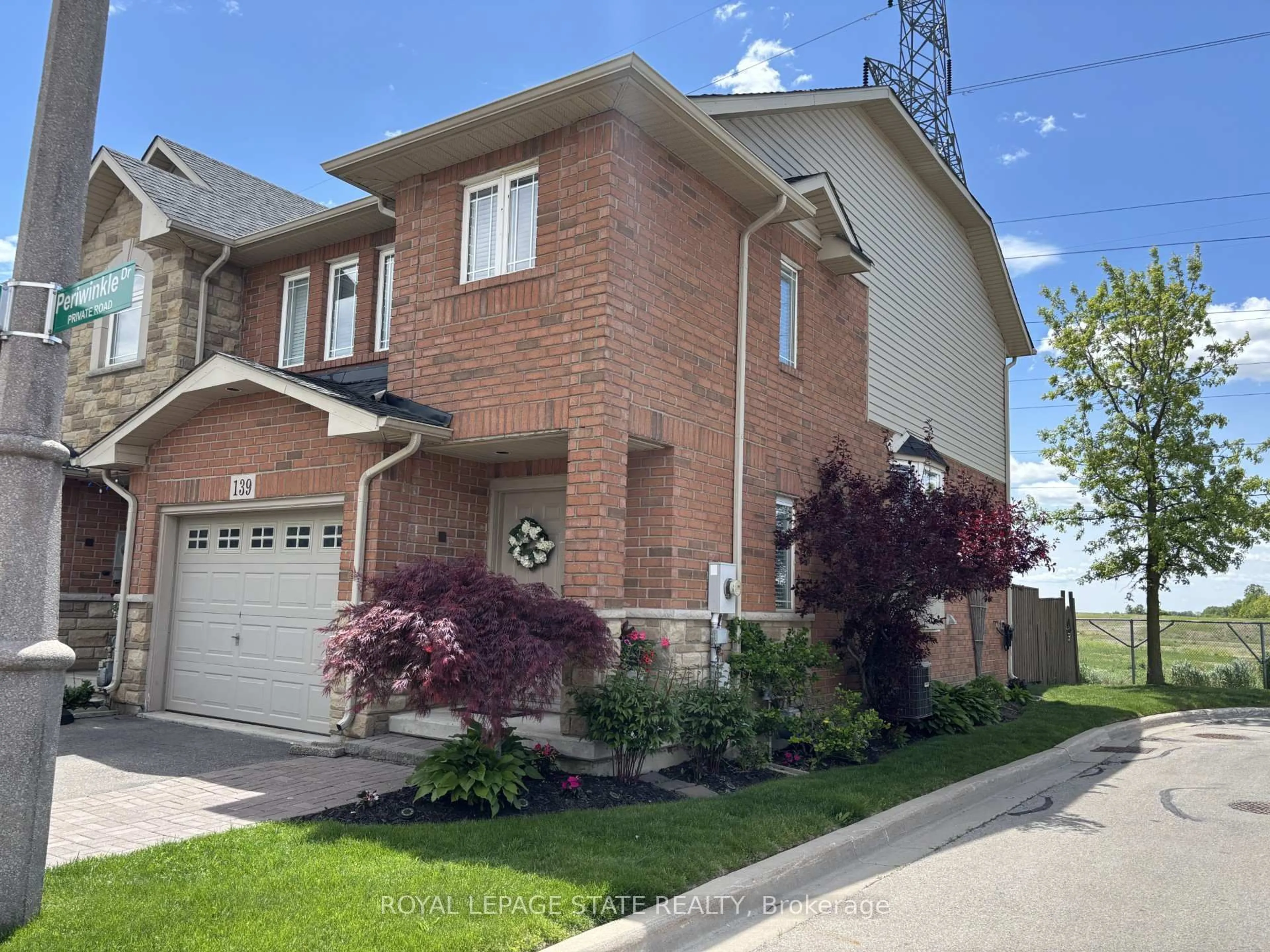 Home with brick exterior material, street for 139 Periwinkle Dr, Hamilton Ontario L0R 1P0